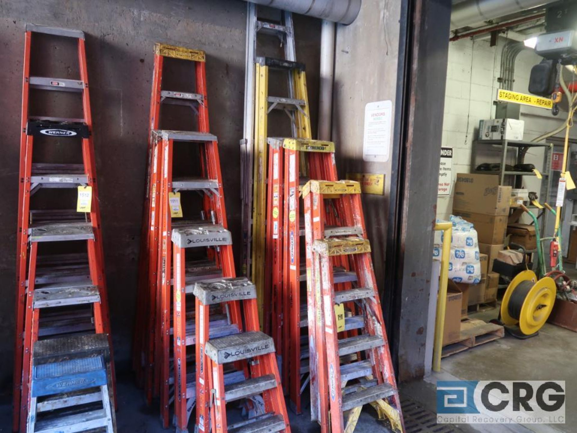 Lot of (12) ladders including (1) aluminum 10 step, (2) 7 step, (4) 5 step, (2) 3 step, (2) 2