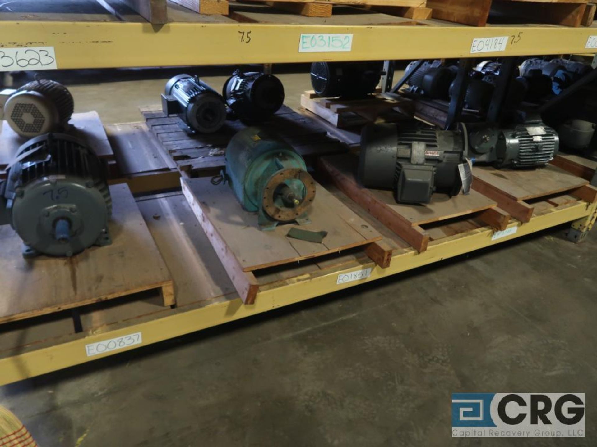 Lot of (32) assorted 15 HP, 10 HP, and 7.5 HP motors on (7) shelves, some with gear drives (Motor