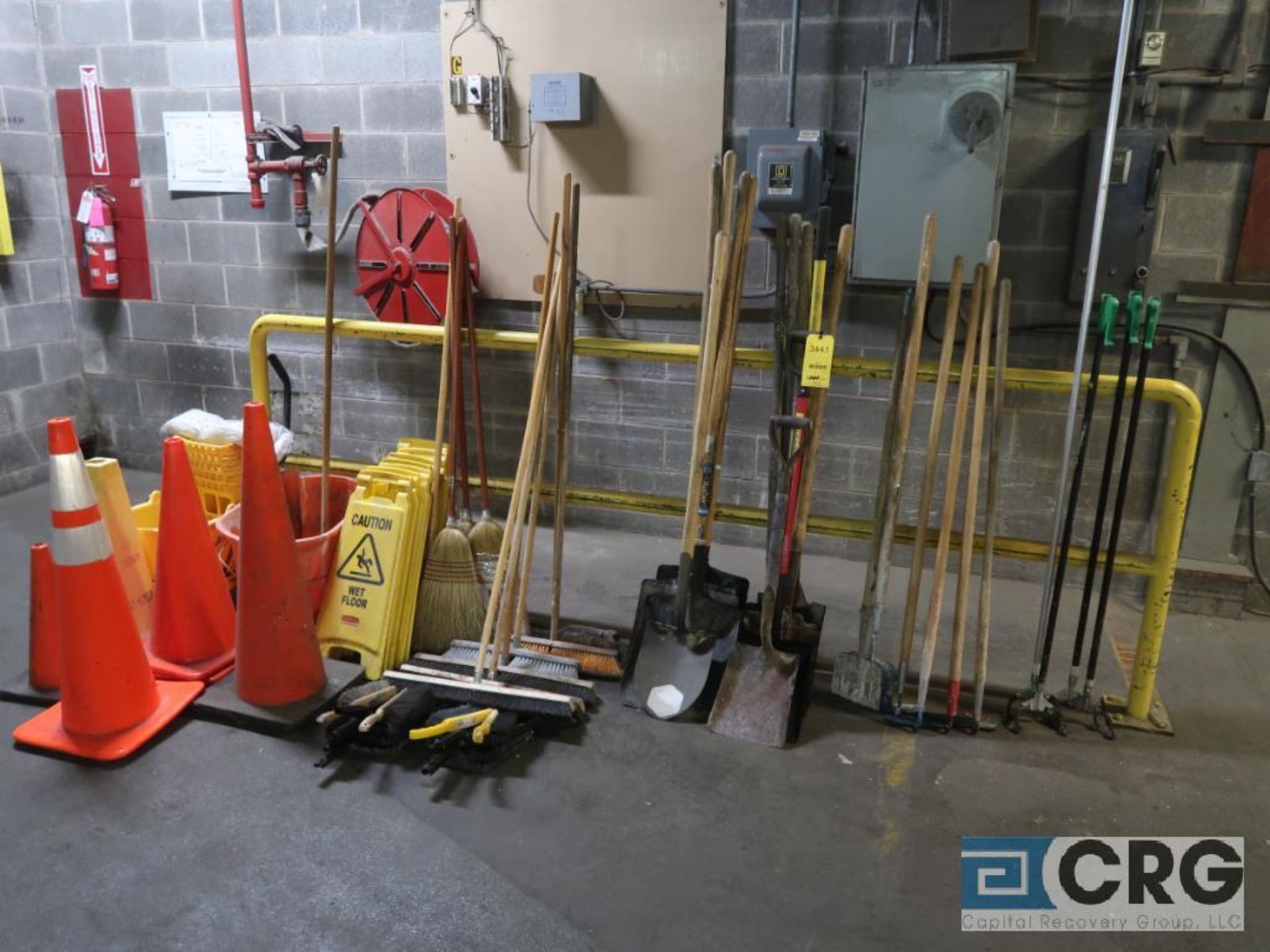 Lot of assorted items including shovels, brooms, hoes, and safety cones (496 Core Cutter Area)