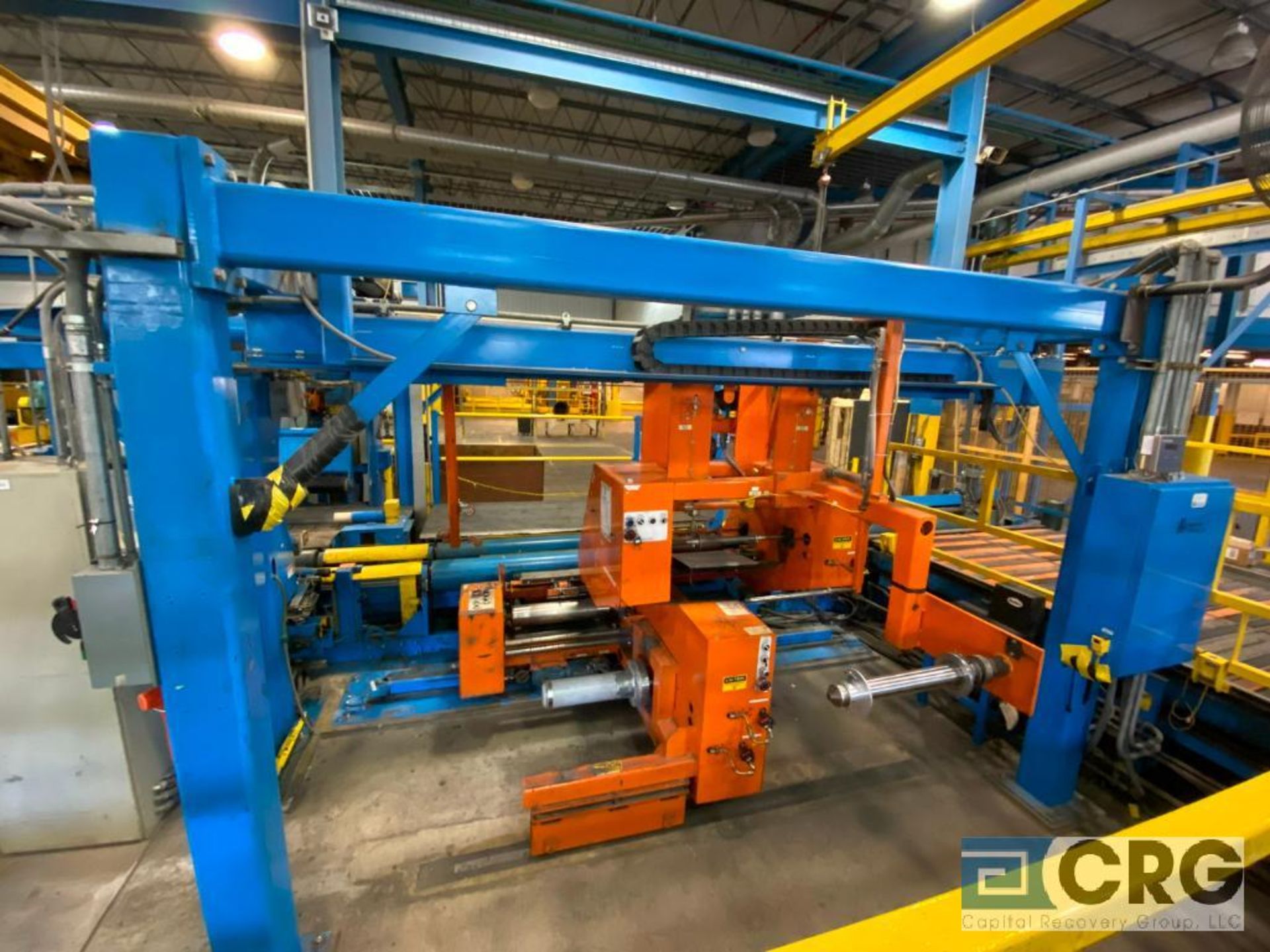 Automatic Handling Inc. end of line auto film roll handling, wrapping and palletizing system,