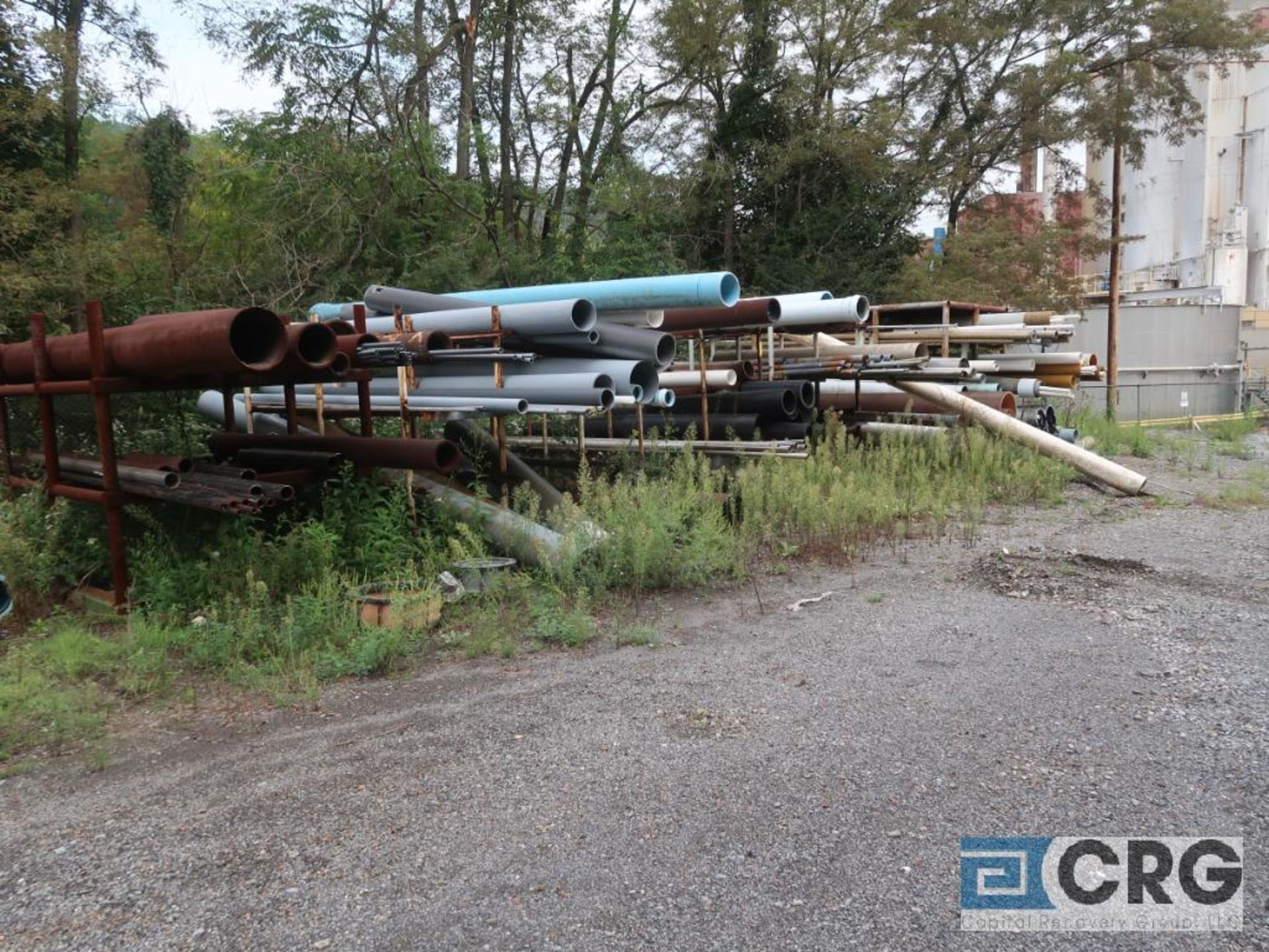 Lot of assorted pipe including steel, stainless, ABS, and PVC on racks, includes racks (Laydown - Image 4 of 4