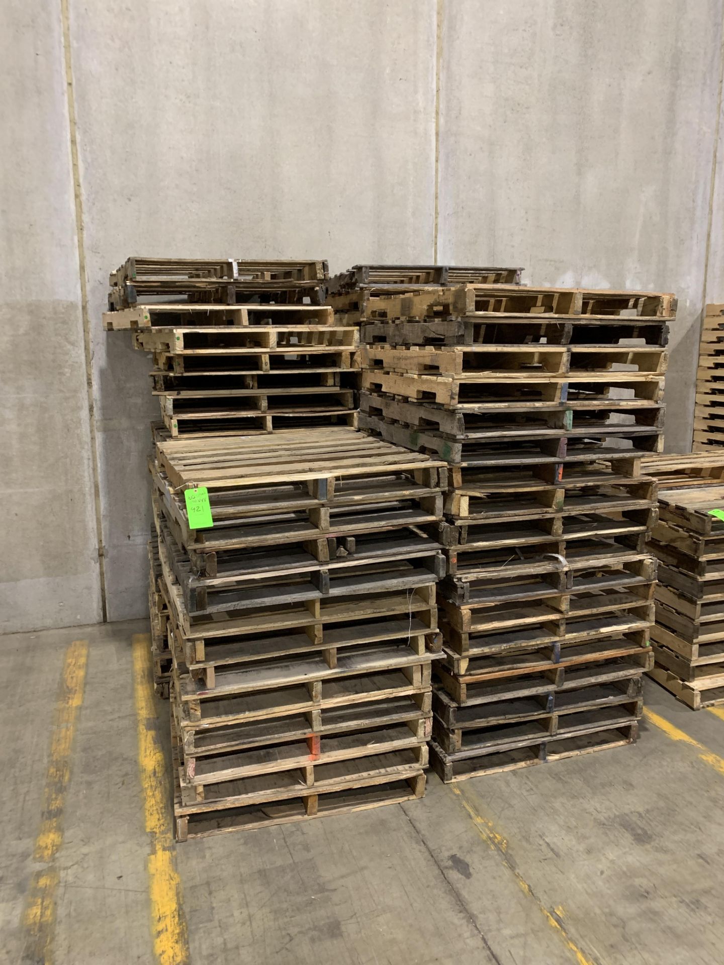 LOT OF 4 STACKS USED PALLETS