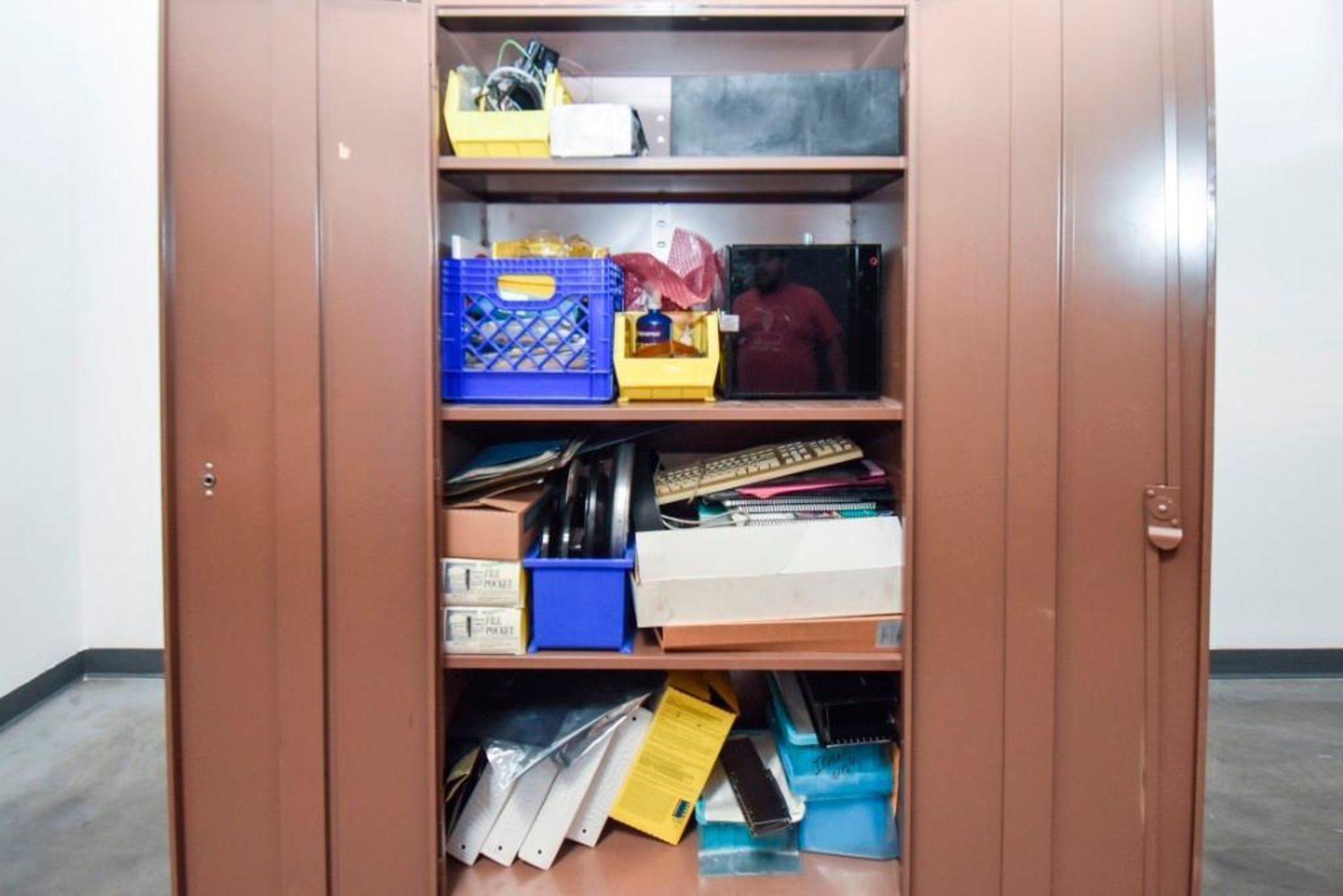 Parkwood Cabinet contains assorted office supplies, earplugs, and program manuals. - Image 2 of 6