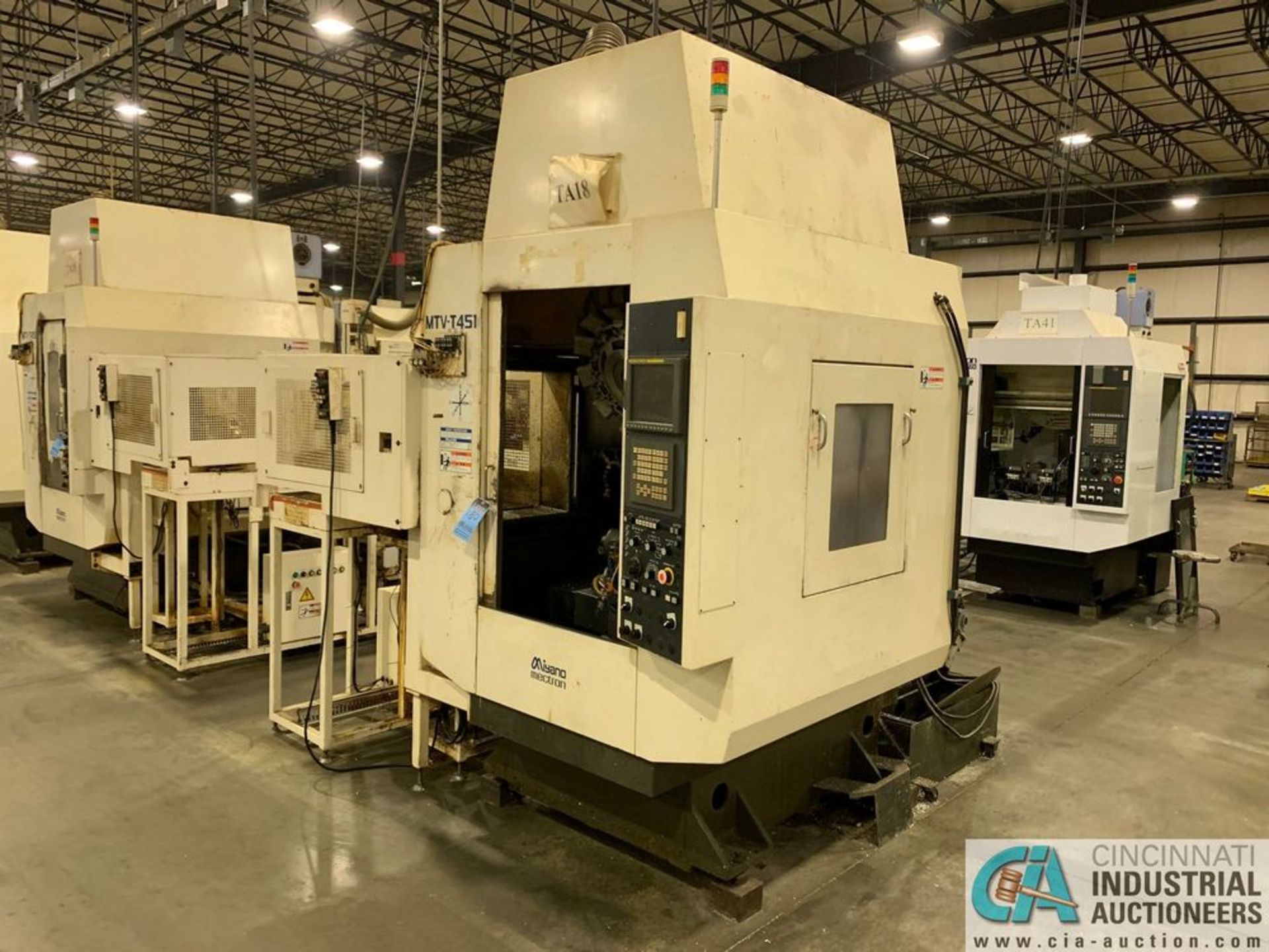 MECTRON MIYANO MODEL MTV-T451 CNC DRILLING & TAPPING CENTER W/ LOADER AND STOCKER TABLE *Loading fee - Image 2 of 11