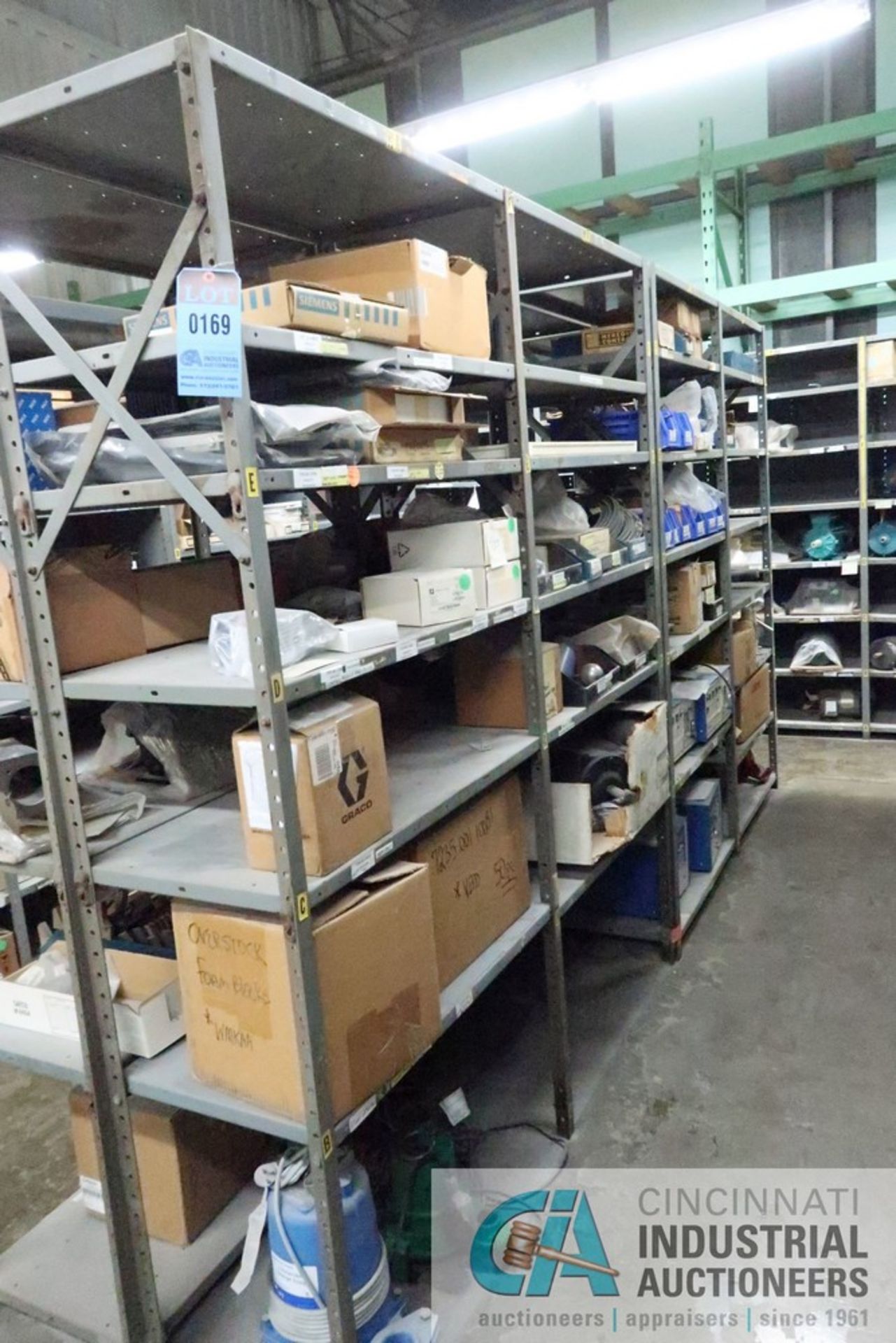 (LOT) (8) SECTIONS STEEL SHELVING W/ MISC. MODULES, CONTROLLERS, VELDING SYSTEMS, PUMPS, LIGHT