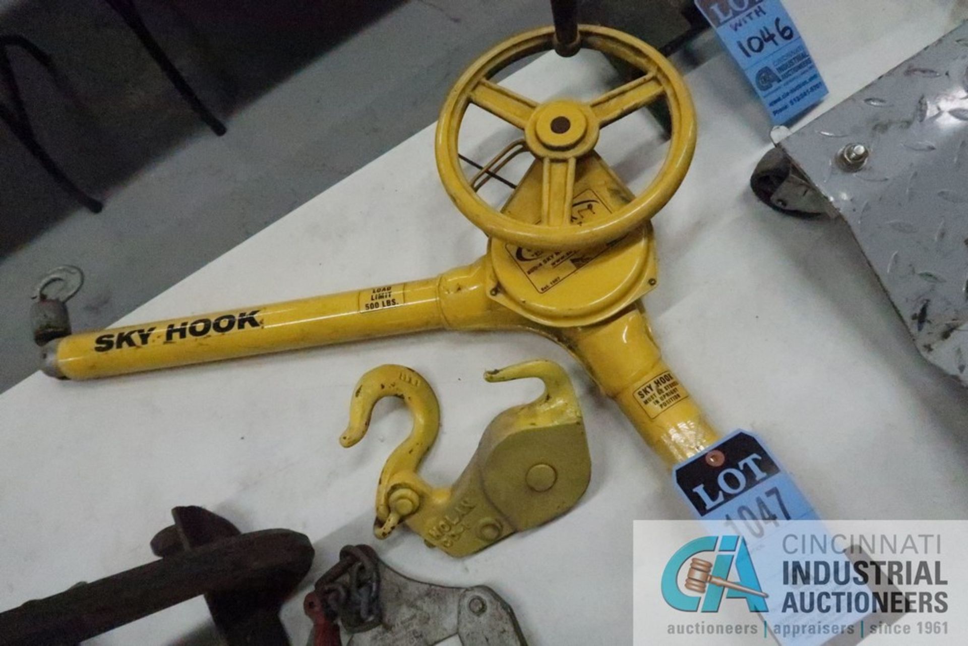 500 LB. CAPACITY CRANK TYPE SKYHOOK WITH TONG STYLE LIFTING ATTACHMENT AND PALLET PULLER - Image 2 of 2