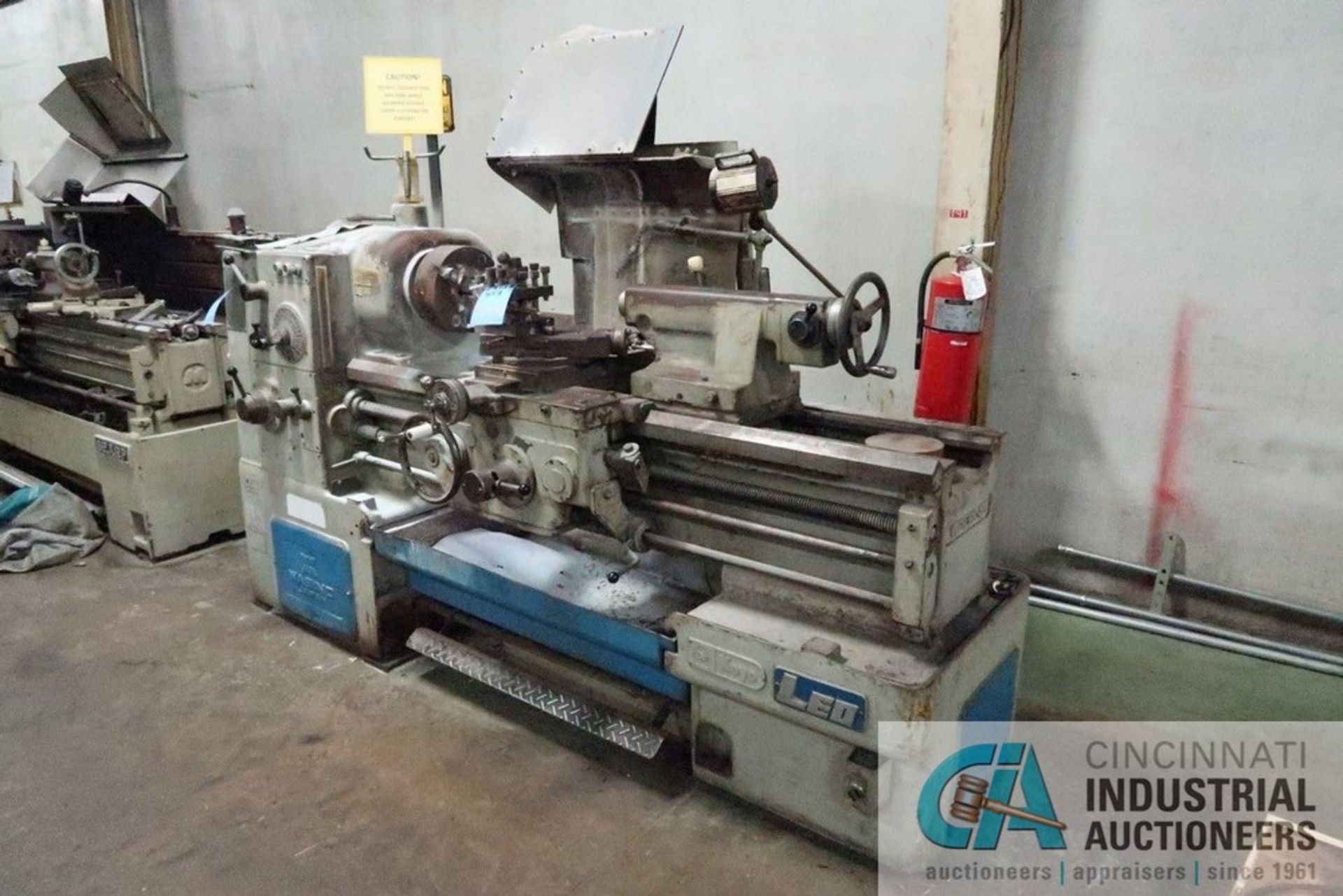 14" X 28" WASINO MODEL LEO-100A ENGINE LATHE; S/N 4680, 6" 3 JAW CHUCK, 3" THRUE HOLE SPINDLE