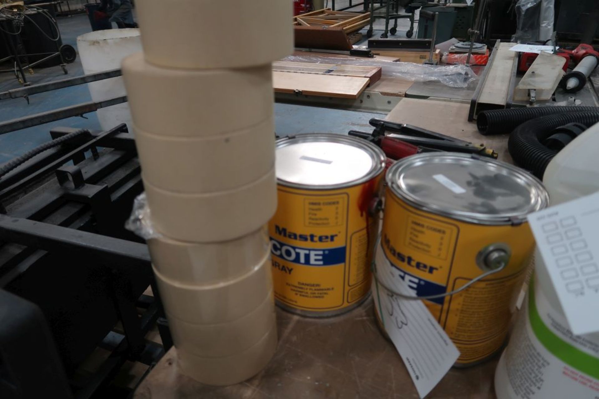 LOT OF 2 GALLONS OF PAINT & TAPE