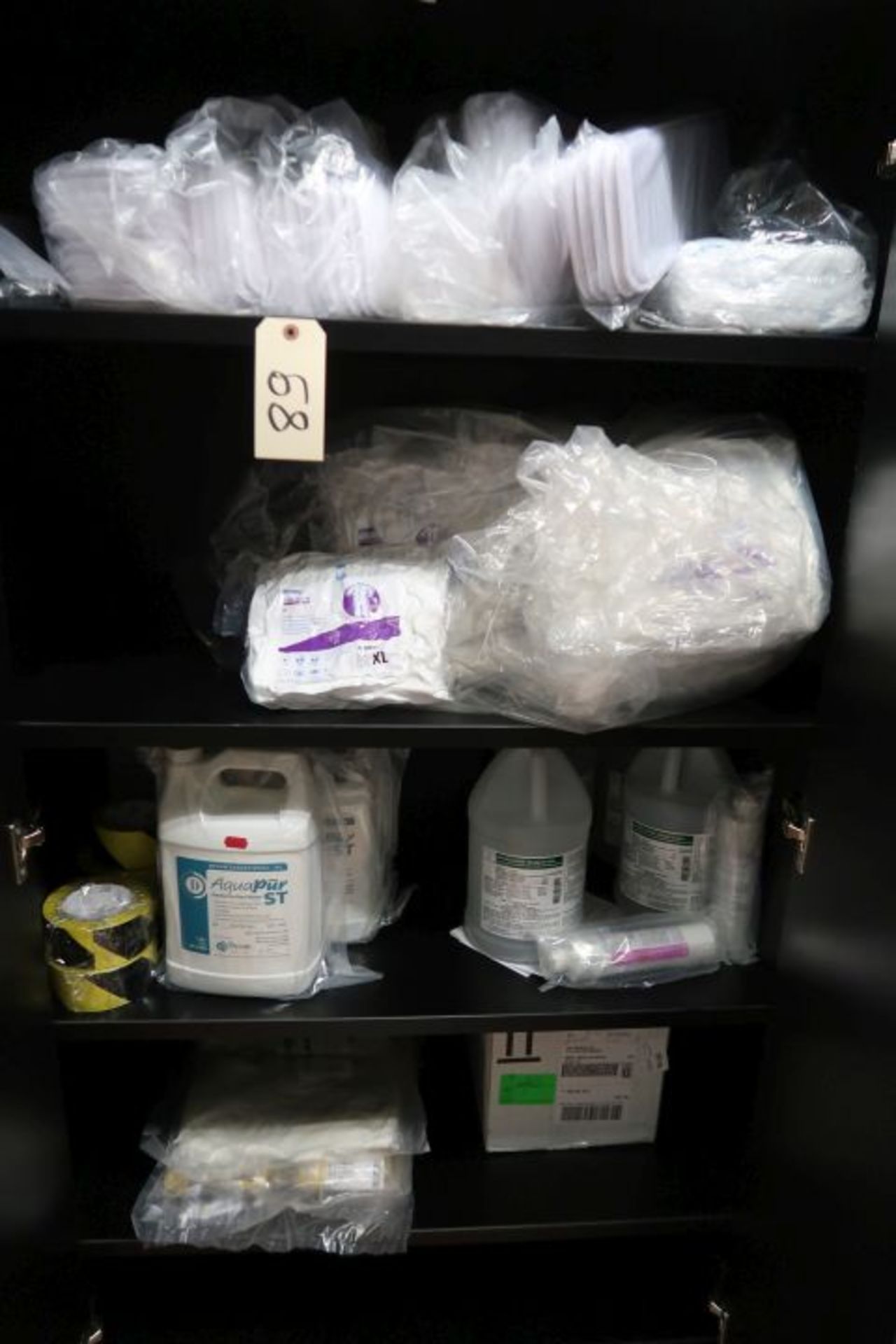 LOT OF ASSORTED CLEAN ROOM APPAREL, PADS, SURGICAL MASKS, STERILE WATER ETC. CONTENT OF CABINET