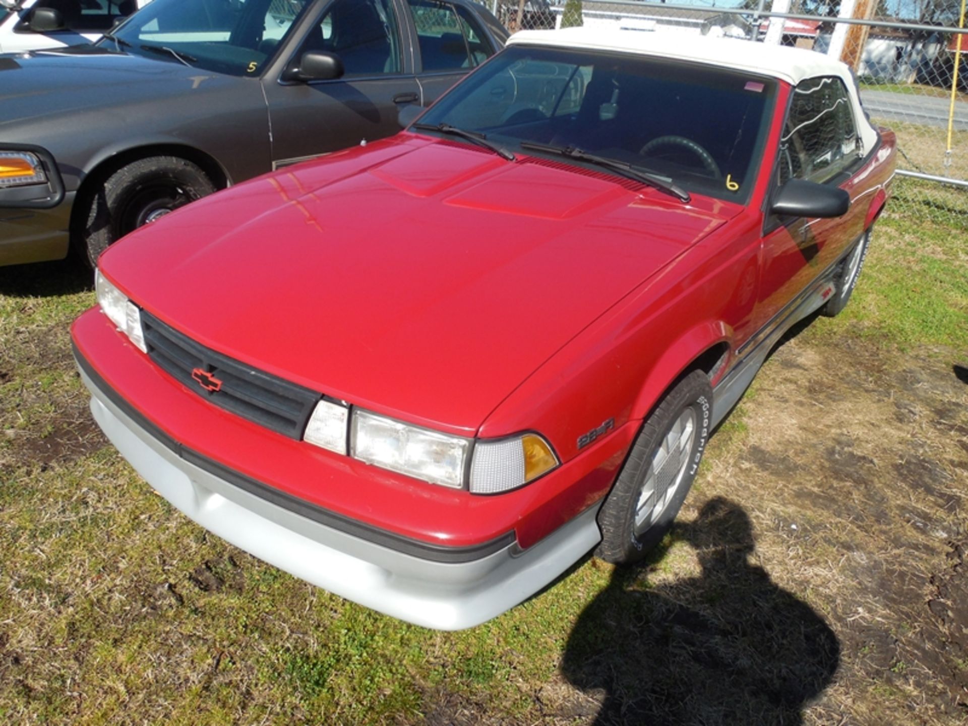 1989 CHEVROLET Cavalier Z24 convertible - 81,992 miles showing rear window in convertible bad -