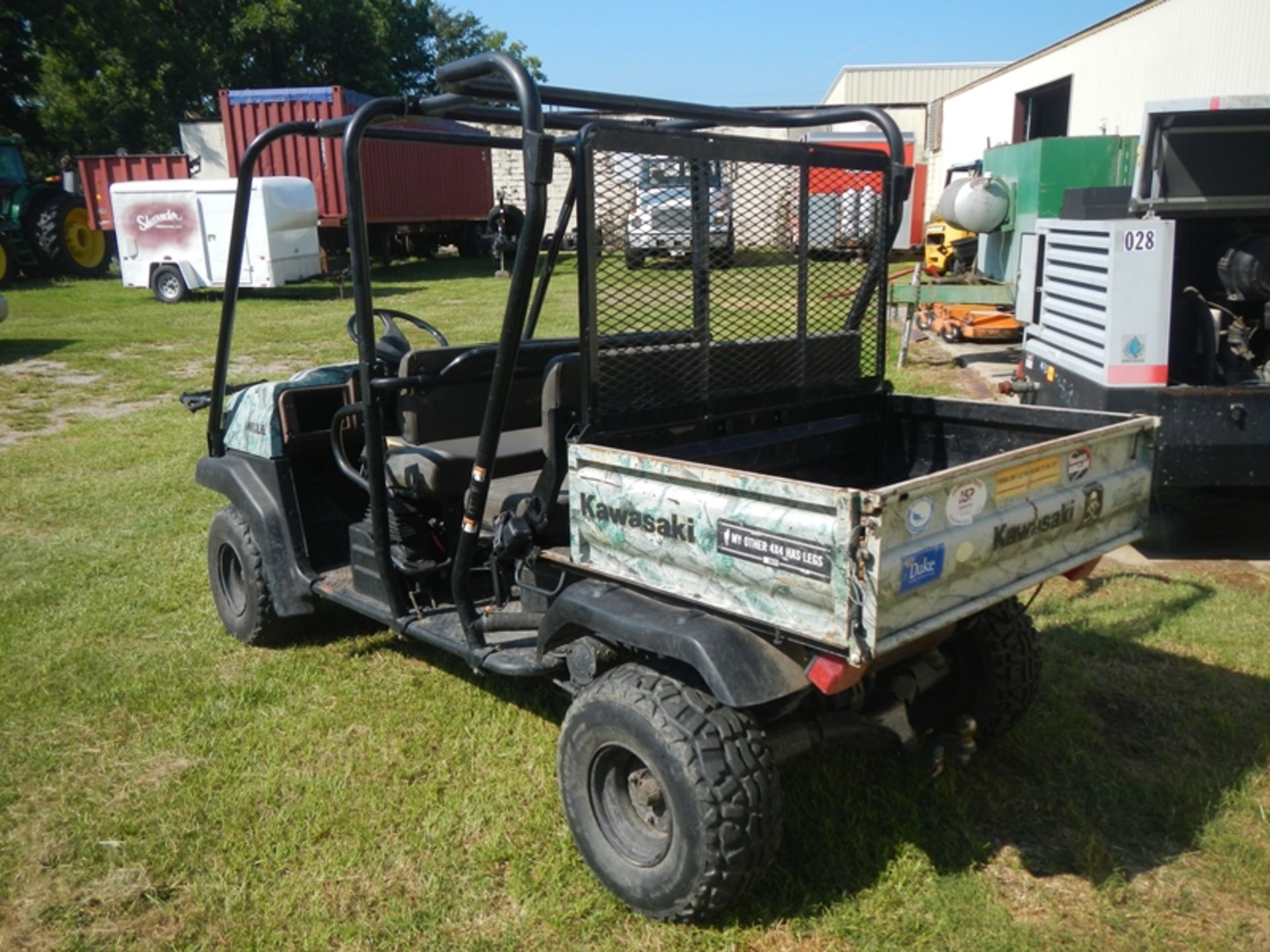 KAWASAKI Mule 3110 2-row seating w/dump body (has cooling system issues water will air lock and - Image 4 of 4