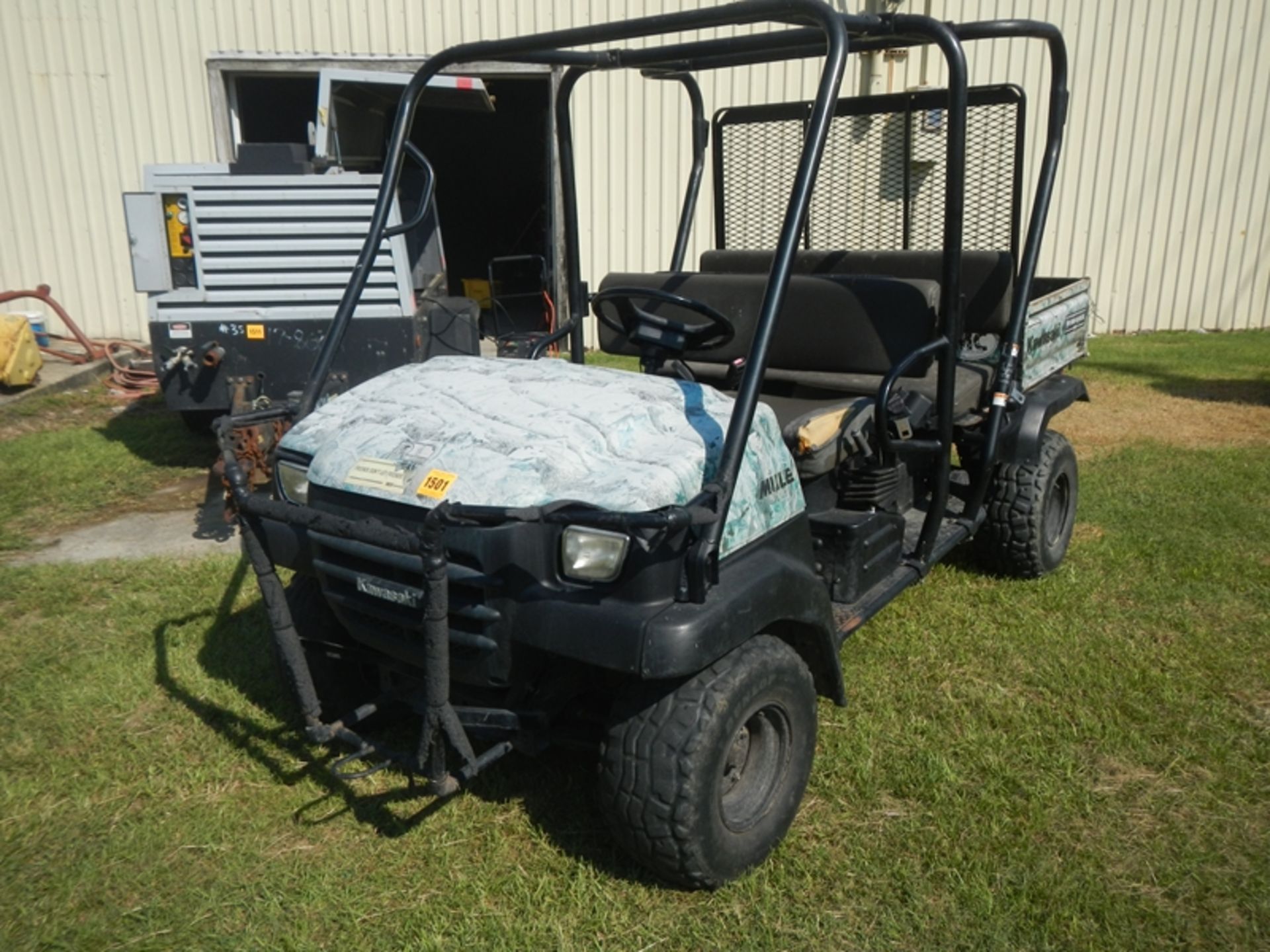 KAWASAKI Mule 3110 2-row seating w/dump body (has cooling system issues water will air lock and