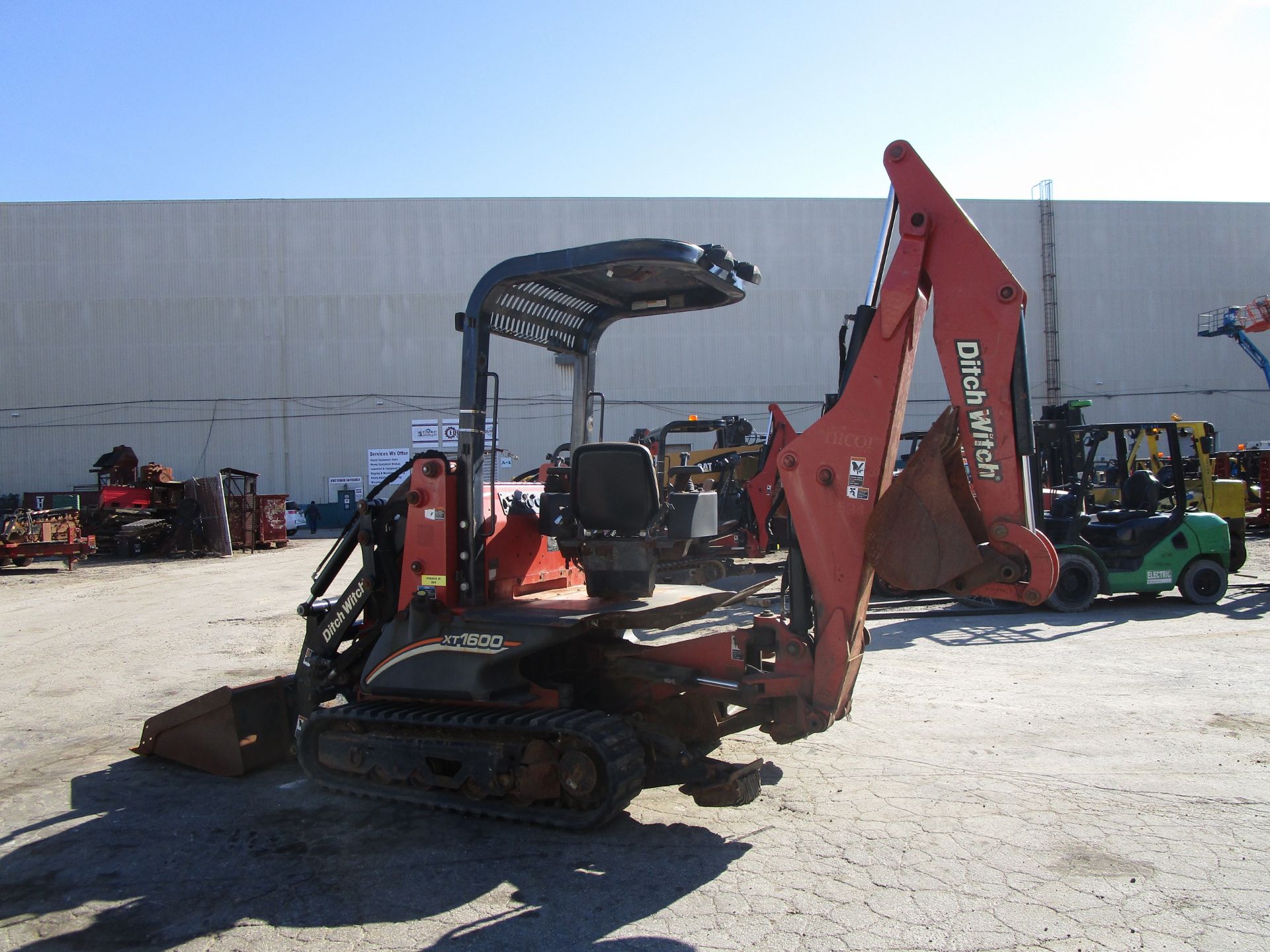 2011 Ditch Witch XT1600 Backhoe with Trailer and Attachments - Image 7 of 24