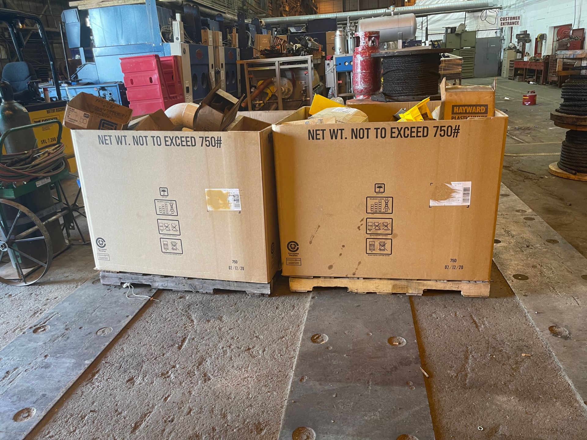 Two Boxes Filled with Pipe Fittings