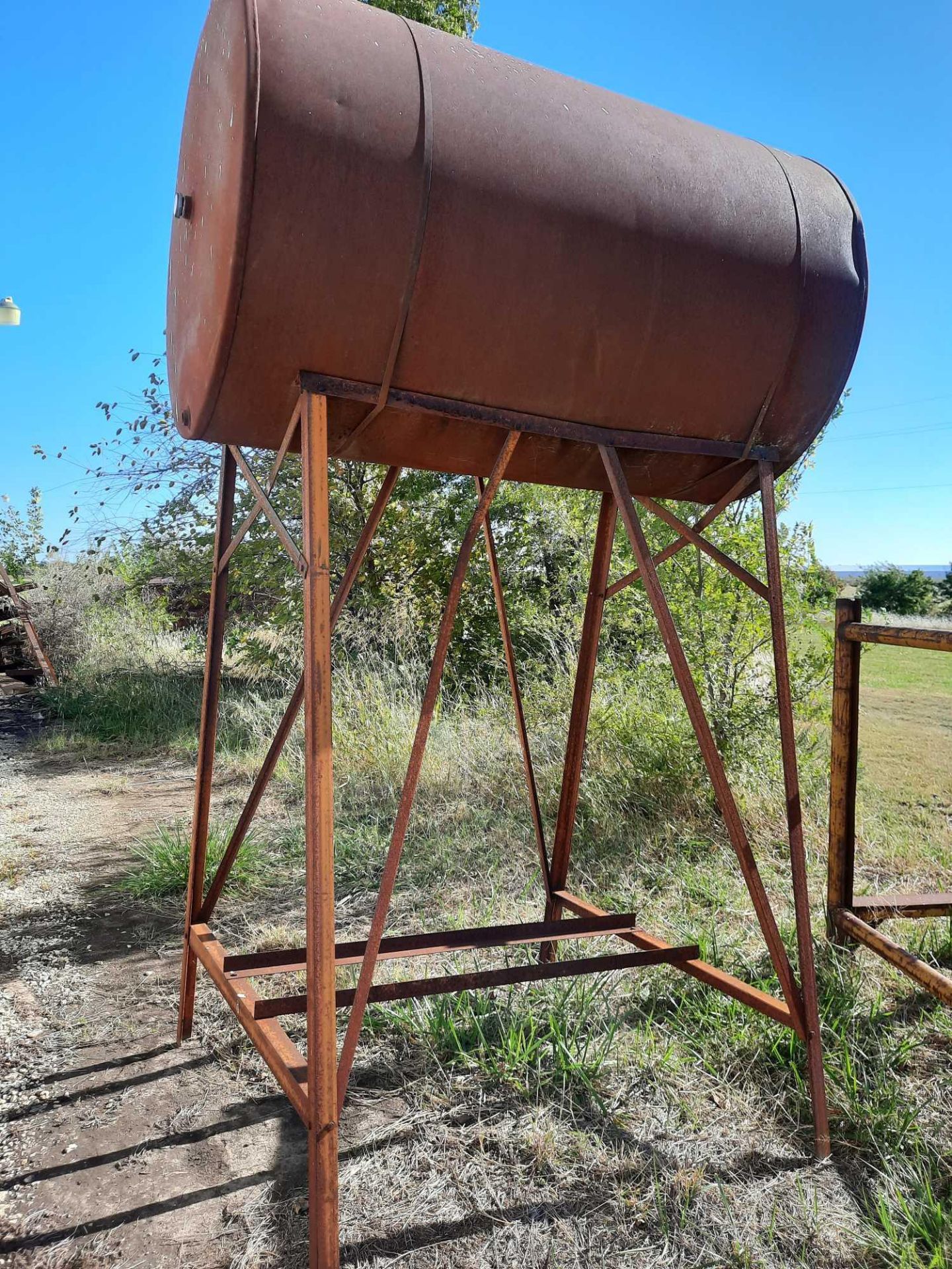 Fuel barrel in stand, barrel 4ft diameter x 6ft length, stand 7ft height (Note: we do not have - Image 2 of 4