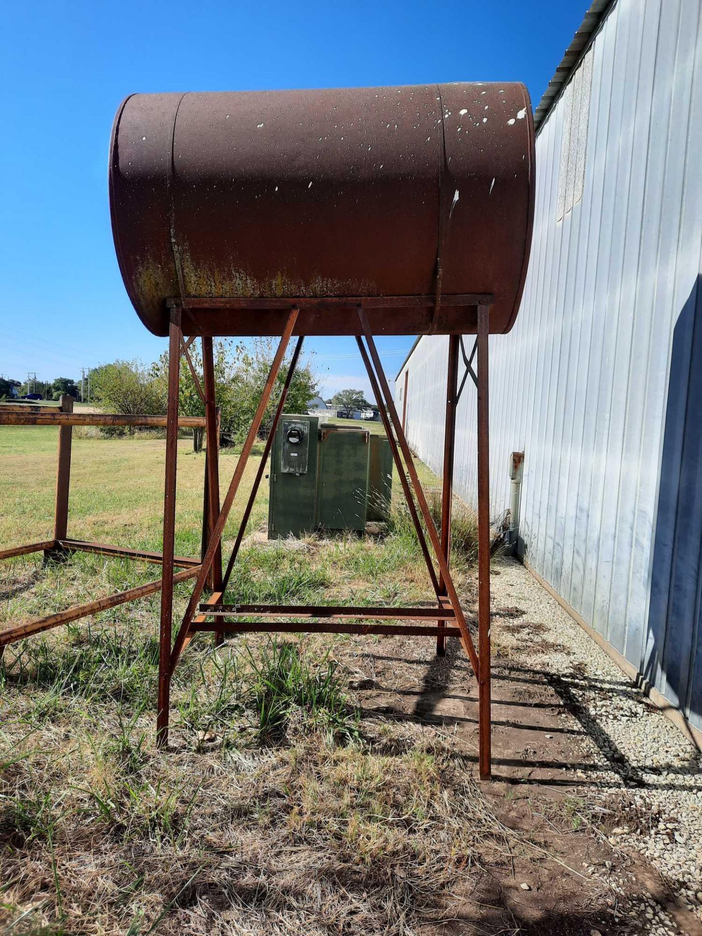 Fuel barrel in stand, barrel 4ft diameter x 6ft length, stand 7ft height (Note: we do not have - Image 3 of 4