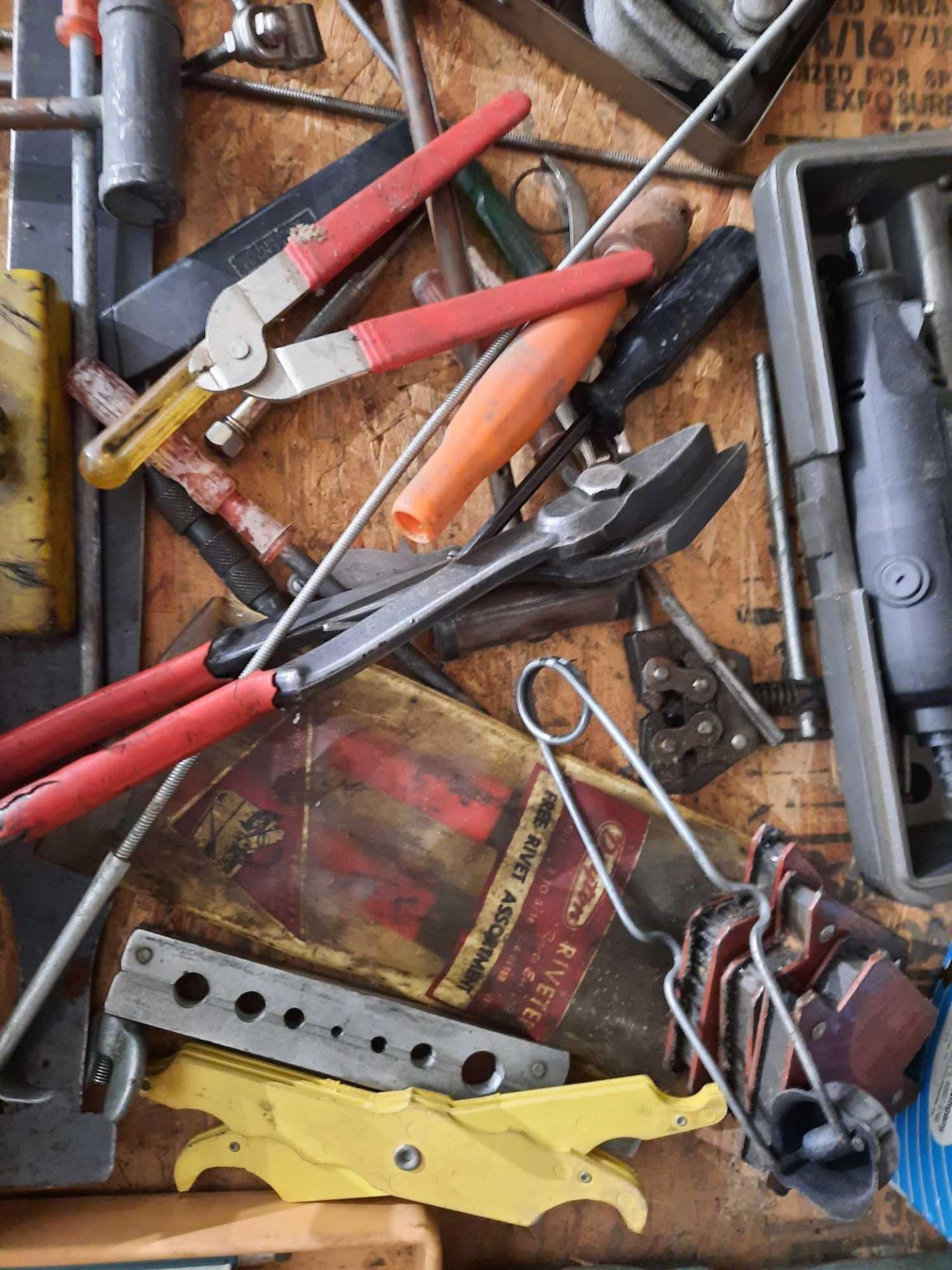 Assorted tools to include, whitney punch, industrial stapler, lockout kit, riveting tool, Dremel - Image 6 of 7