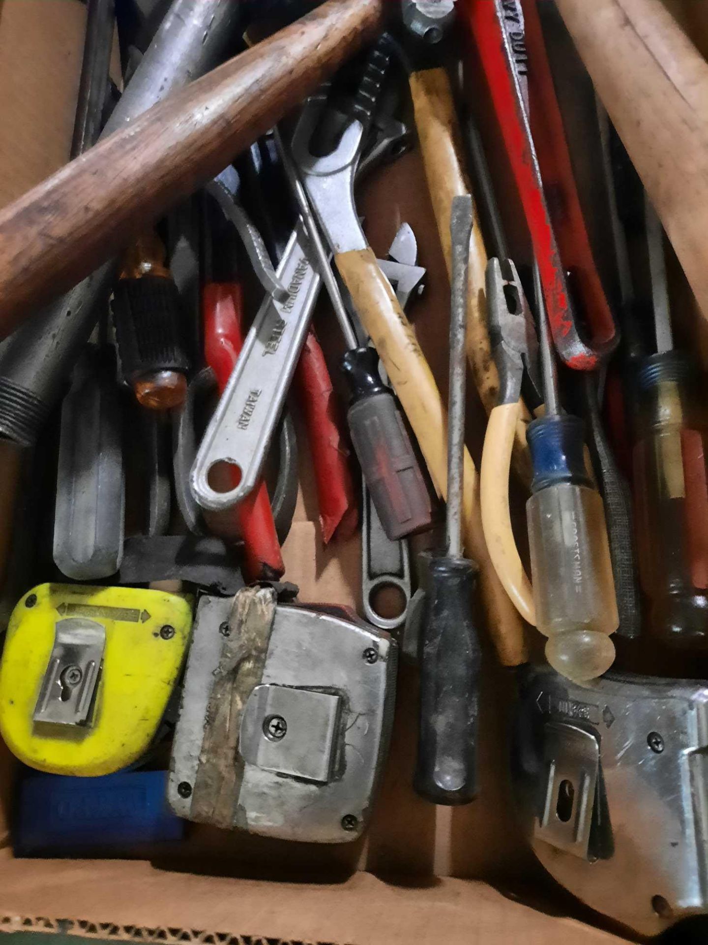 Assorted tools, hammers, wrenches, screwdrivers, cutters, measuring