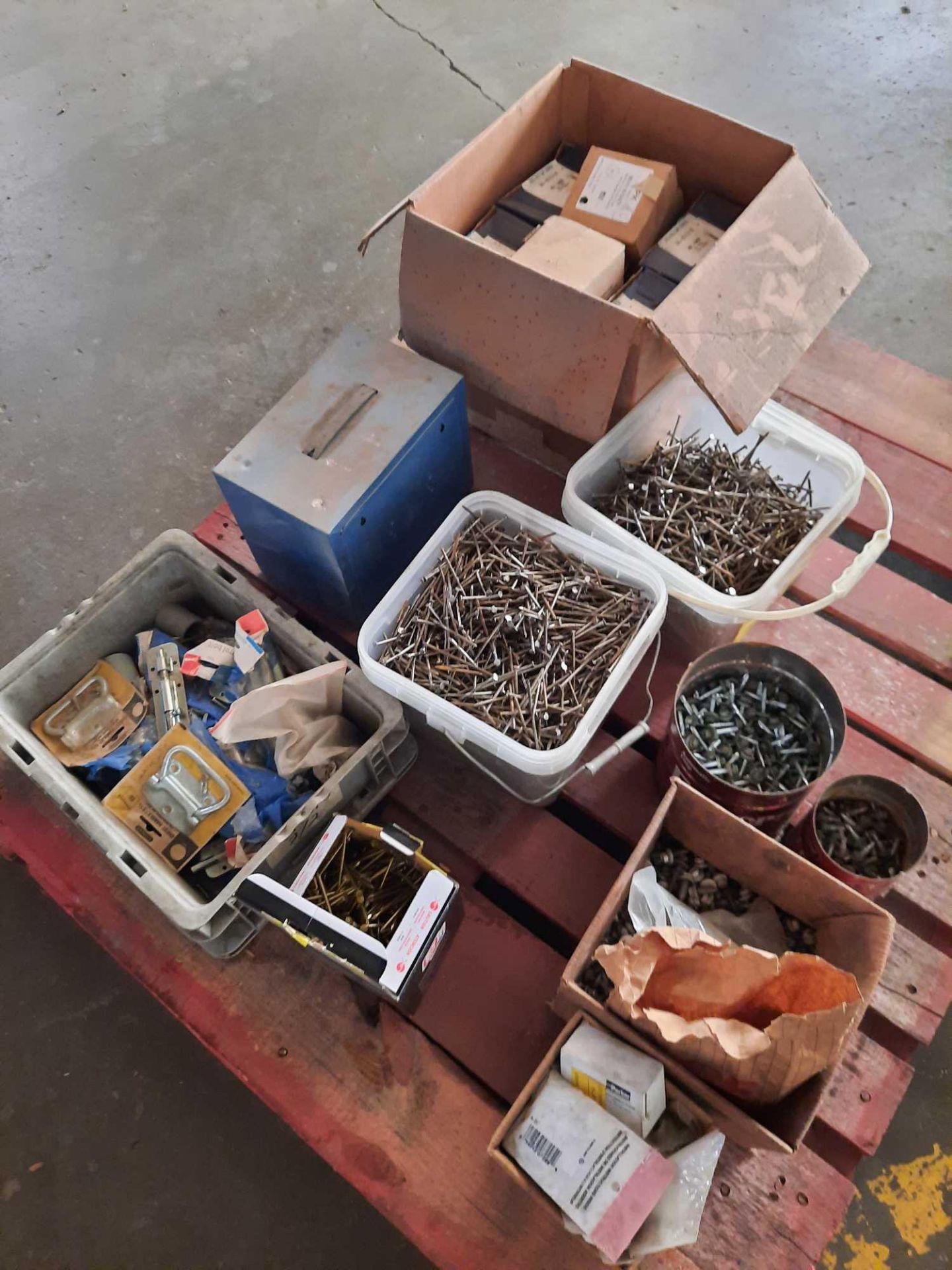 Assortment of hardware to include nails, bolts, screws, and more