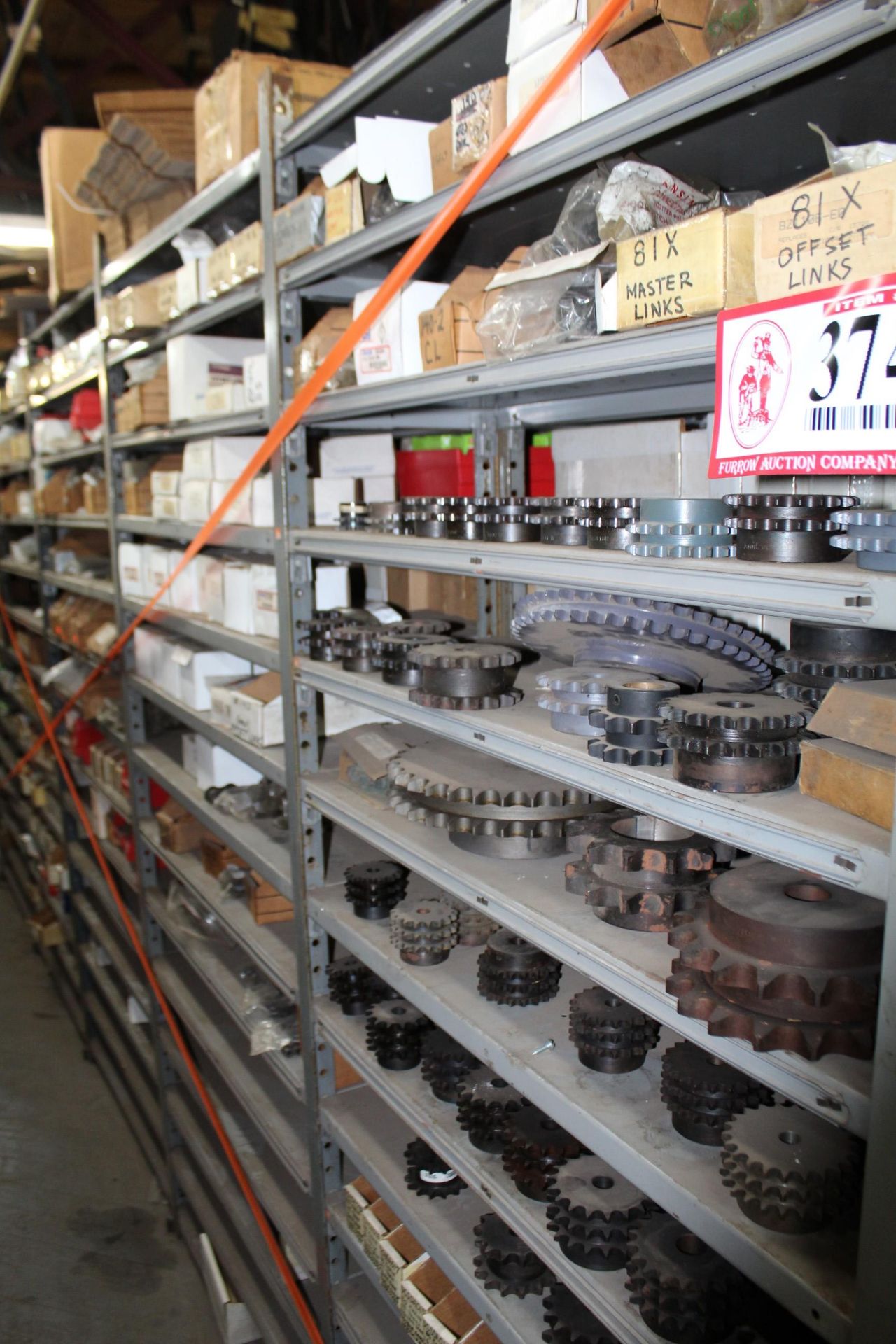 Contents of (6) Sections of Shelving- Various Sized Sprockets, Offset Links, Chain Links, Master