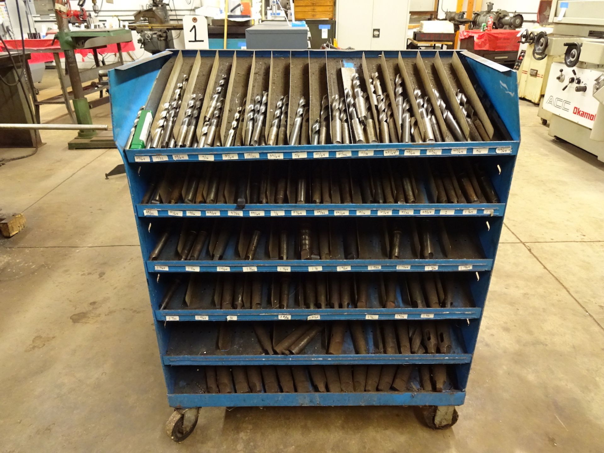 LOT ASSORTED DRILLS IN PORTABLE STORAGE RACK