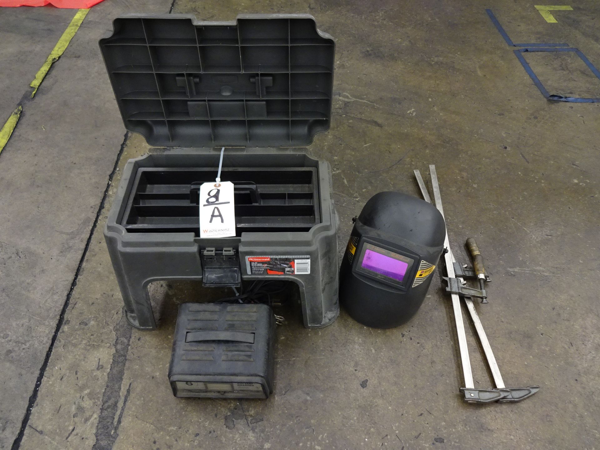 LOT: STOOL , CHARGER, WELDING HELMET, CLAMPS