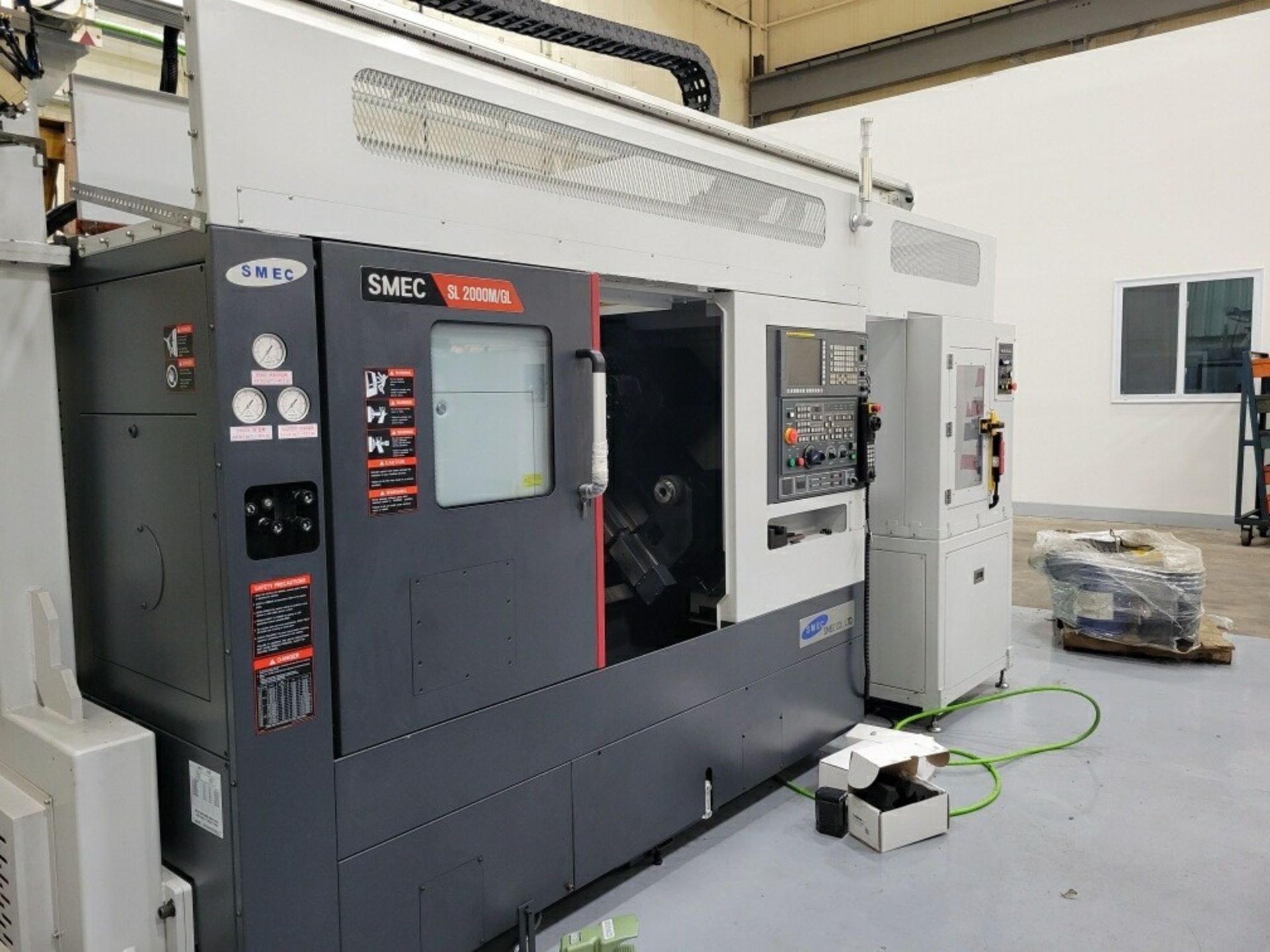 THIS LOT IS FOR 2 NEW NEVER USED 2021 SAMSUNG SL 20000BM/GL CNC LATHES W/ MILLING AND GANTRY LOADED