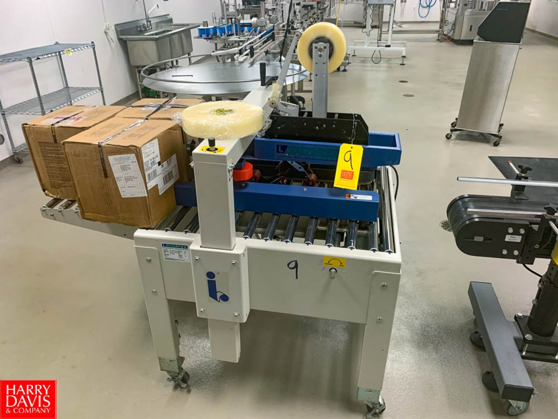 Interpack Carton Sealer With 115 Volts, S/N: TM205 10 M 012 Model: USC 2220-SB-II Rigging: $50