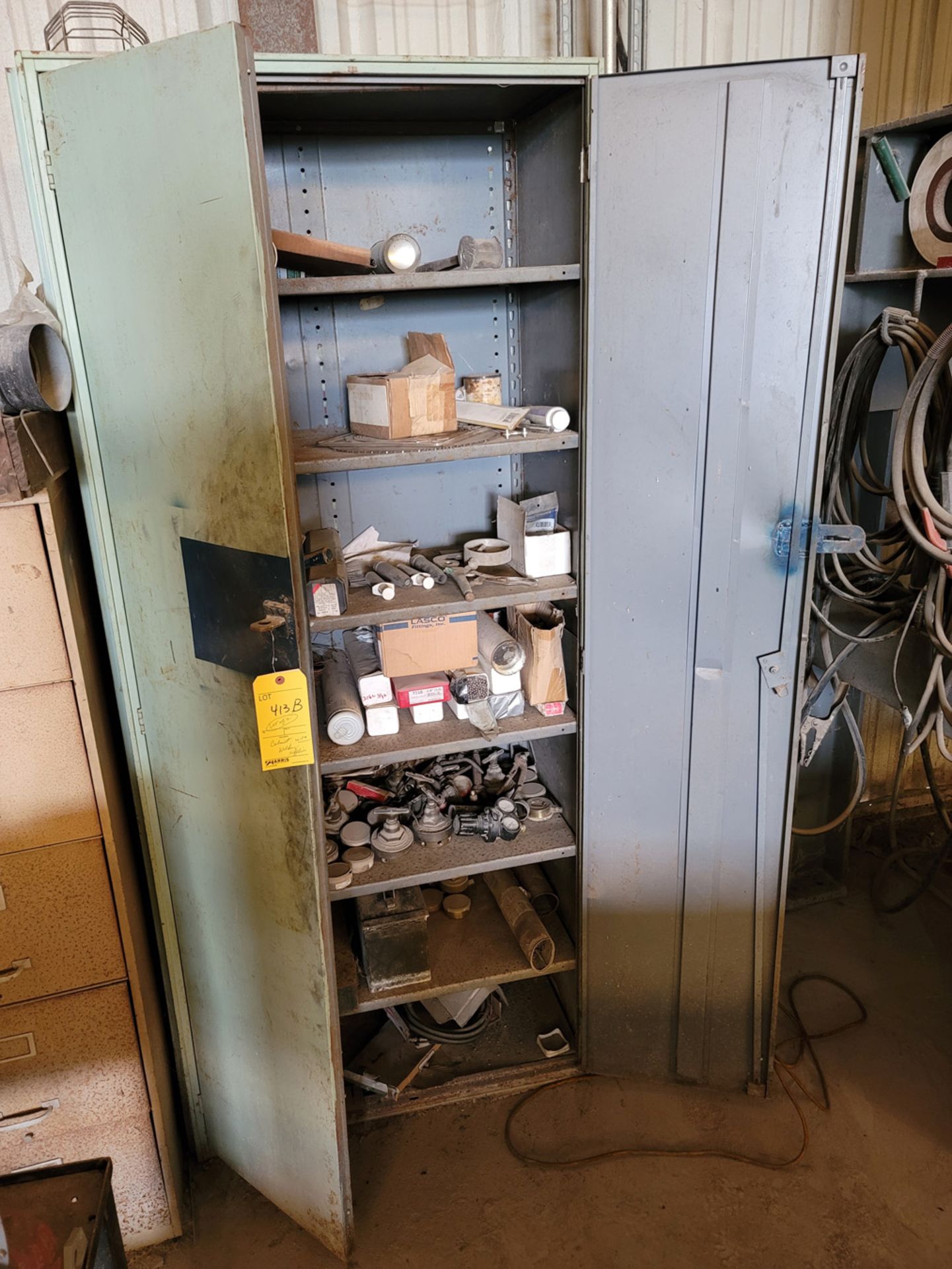 Cabinet with Welding Supplies and Wire Coils