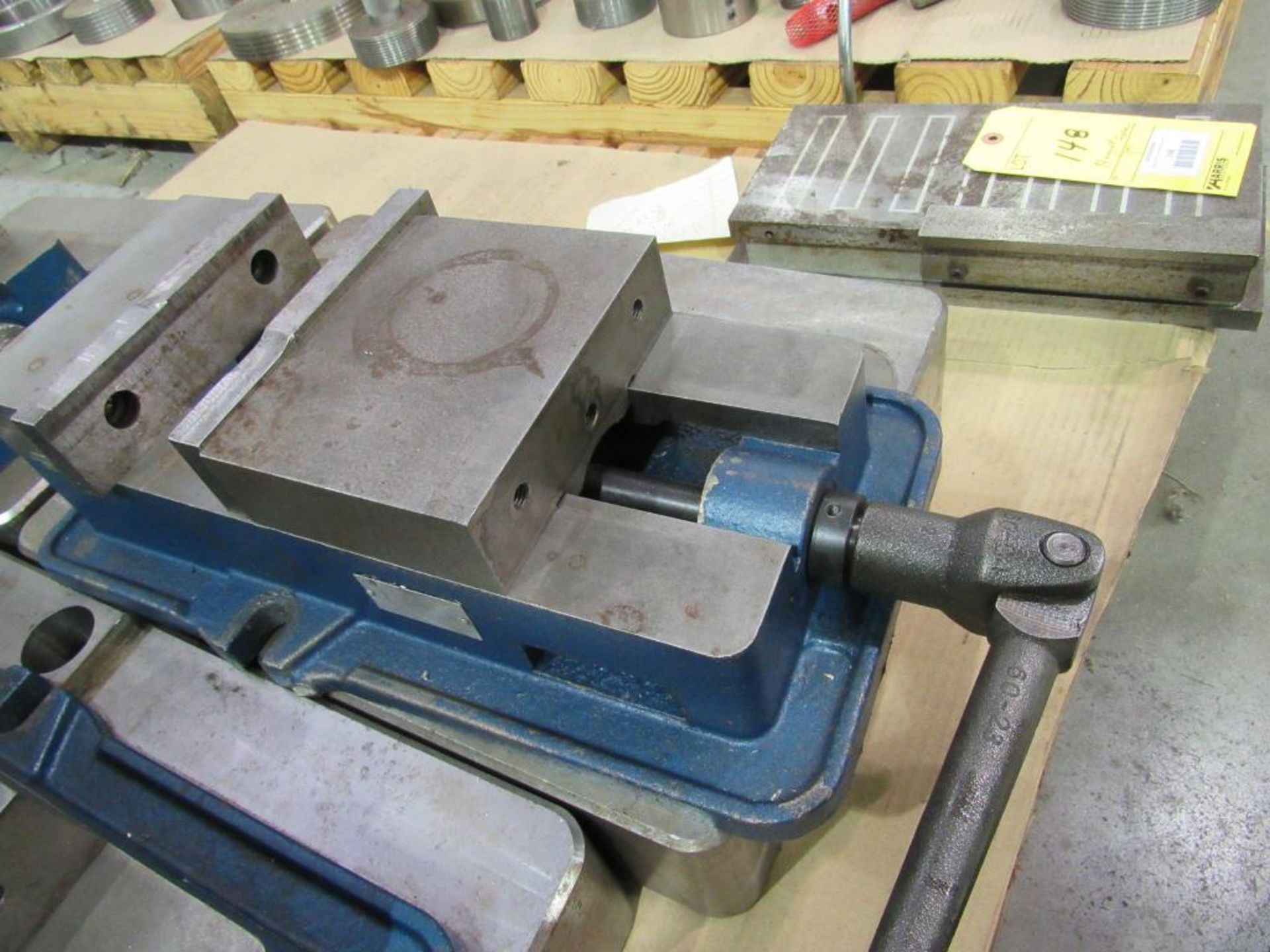 6" Vise with 16-3/4" L x 12-1/2" W x 3-1/2" T Risers