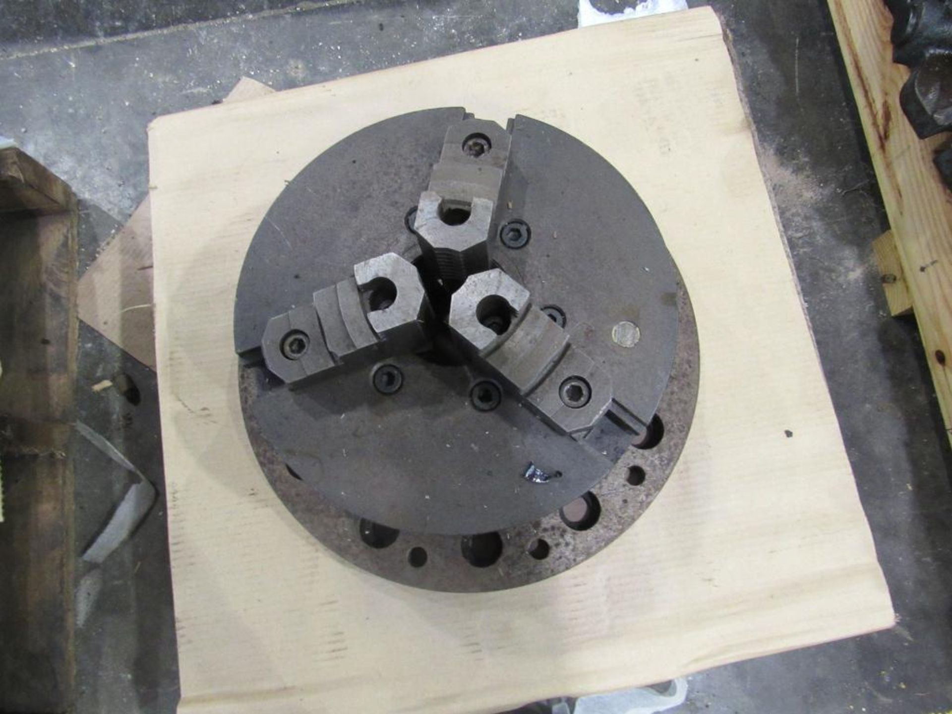 12" 3-Jaw Buck Chuck with 3" Thru-Hole mounted on custom 16" base; 12 holes, 1-1/4" with 3/4" dia. - Image 2 of 3