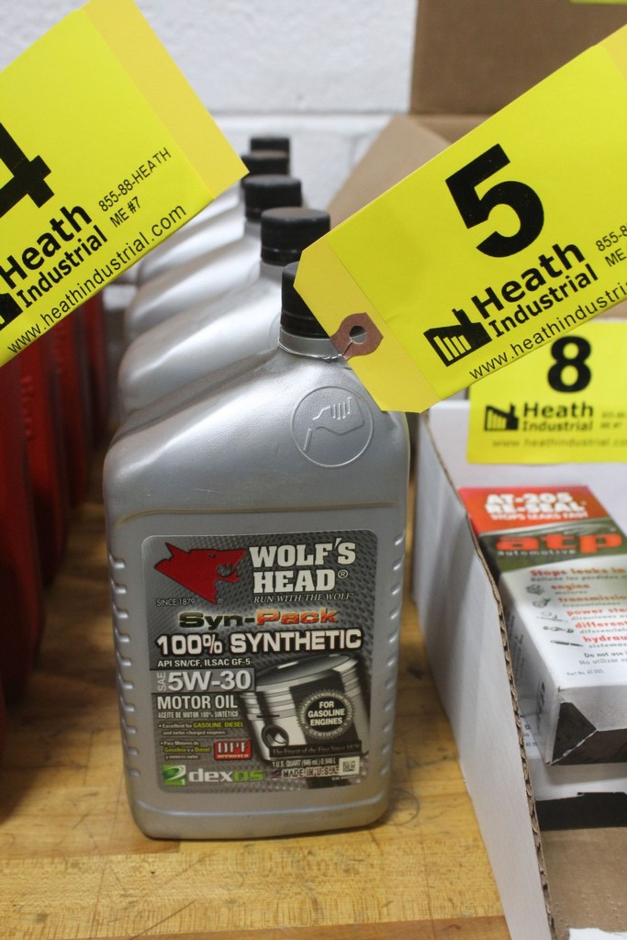 (5) QUARTS OF WOLF'S HEAD SAE 5W-30 SYNTHETIC BLEND HIGH MILEAGE MOTOR OIL