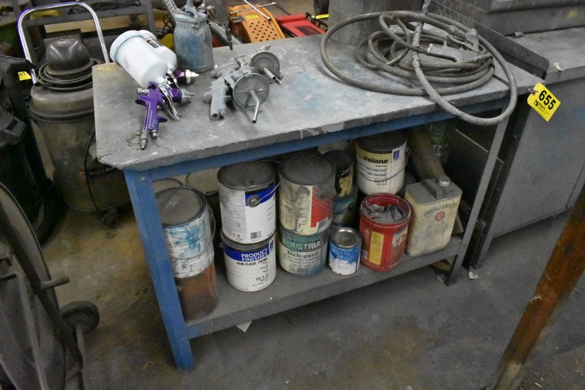 48" X 24" X 34" WORKBENCH WITH ASSORTED PAINTS & PRIMERS