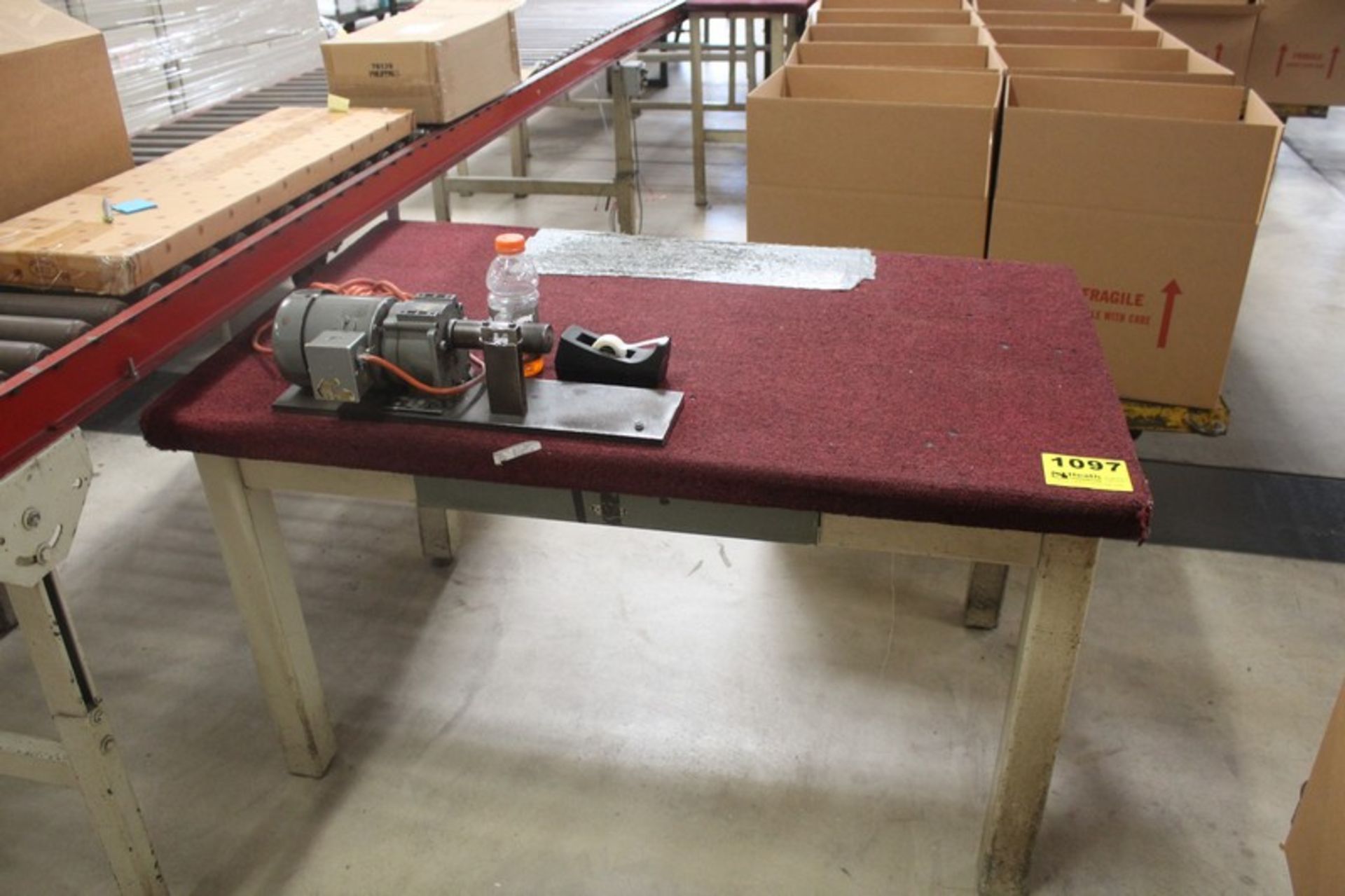 52" X 33" X 30" STEEL FRAME ASSEMBLY WORK BENCH, CARPETED TOP, MOUNTED ELECTRIC GEAR MOTOR