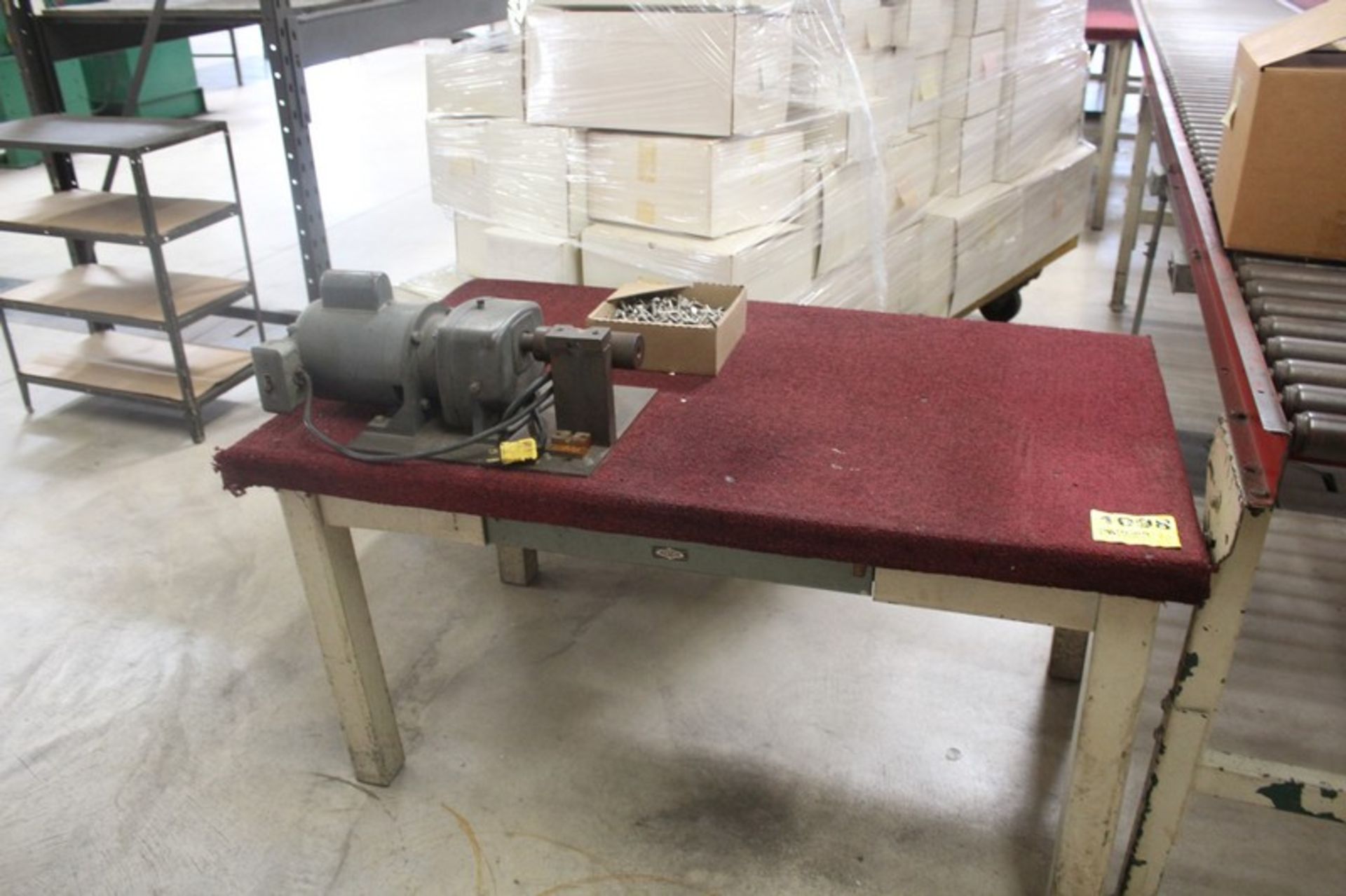 52" X 33" X 28" STEEL FRAME ASSEMBLY WORK BENCH, CARPETED TOP, MOUNTED ELECTRIC GEAR MOTOR