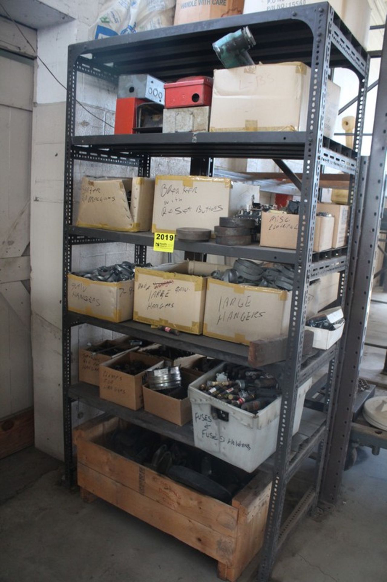 SHELVING UNIT WITH CONTENTS OF BREAKERS, STARTERS, HANGERS, FUSES, ETC.