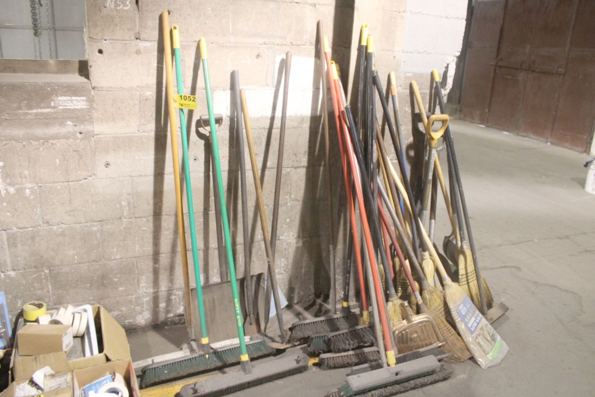 LARGE QTY OF SHOVELS & BROOMS