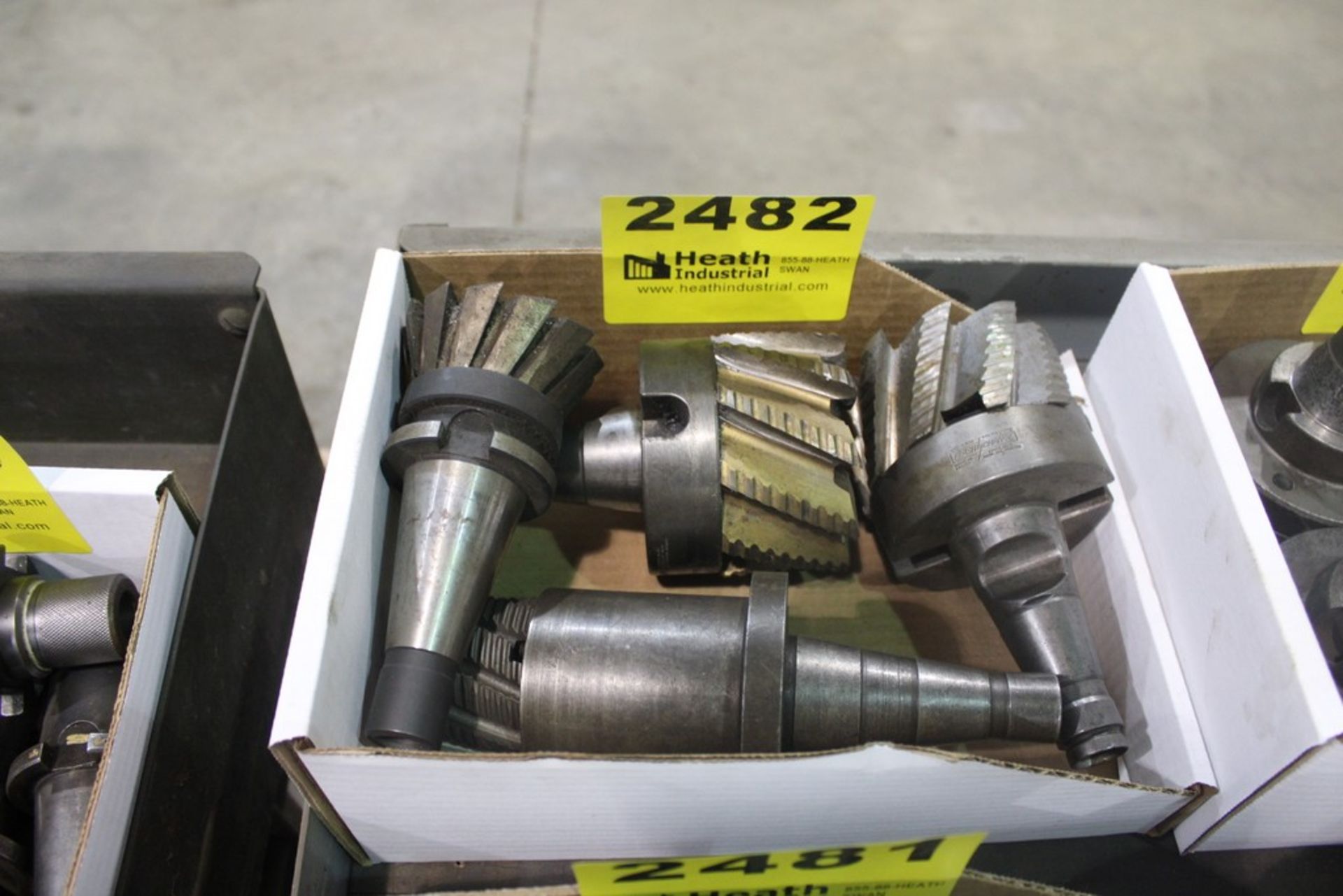 (4) 40 TAPER TOOL HOLDERS WITH SHELL MILLS