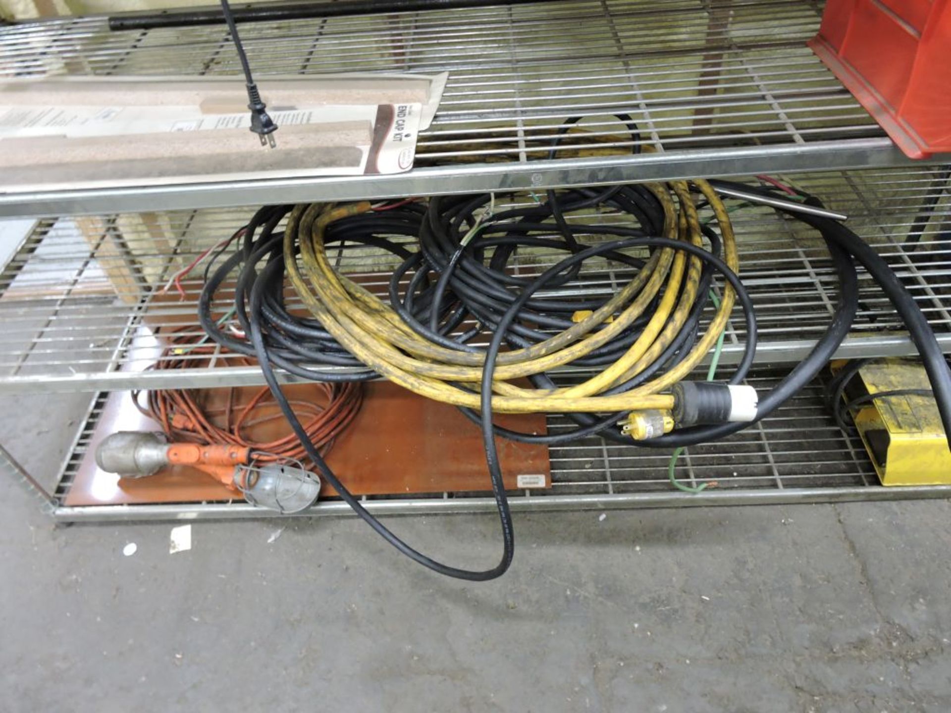 Assorted drop cords, h.d. wiring & Hubbell hookups, trouble light, other assorted items on shelves. - Image 3 of 4