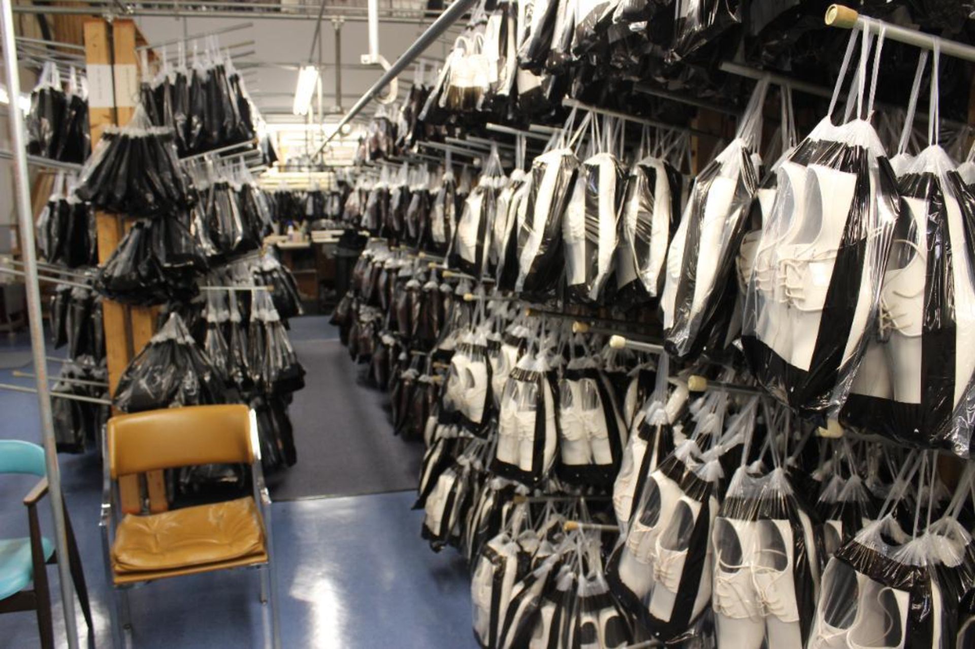 Approx 2639 pairs of shoes on racks behind office area (does not include shoes under mezzanine) - Image 2 of 9