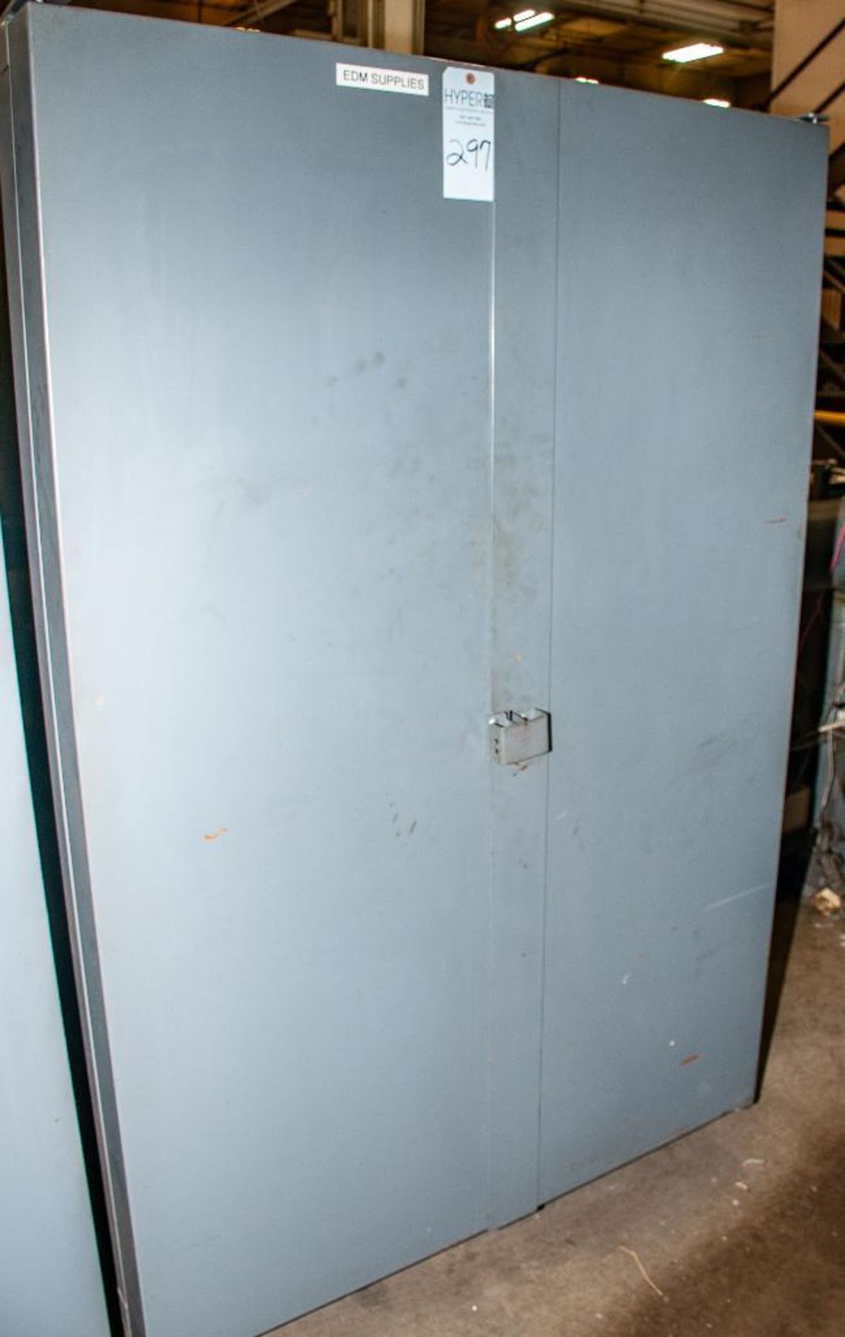 Heavy Duty Steel 2-Door Cabinet And Contents, Marked "EDM Supplies" See Photos -Located 1855 Roberts