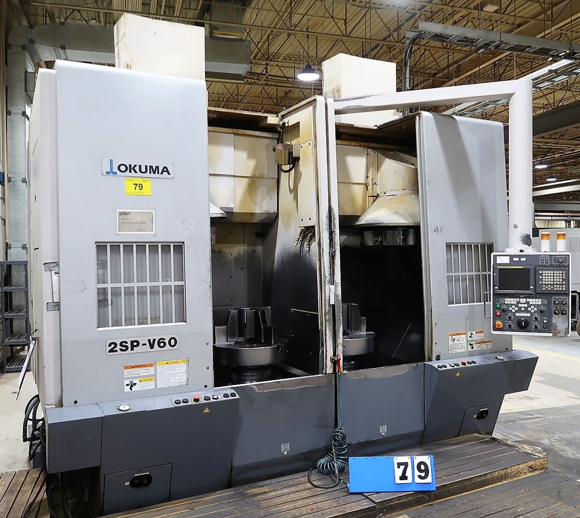 2006 OKUMA 2SP V60 TWIN SPINDLE CNC VERTICAL TURNING CENTERS, FANUC 18i T CNC CONTROL, 12-STATION