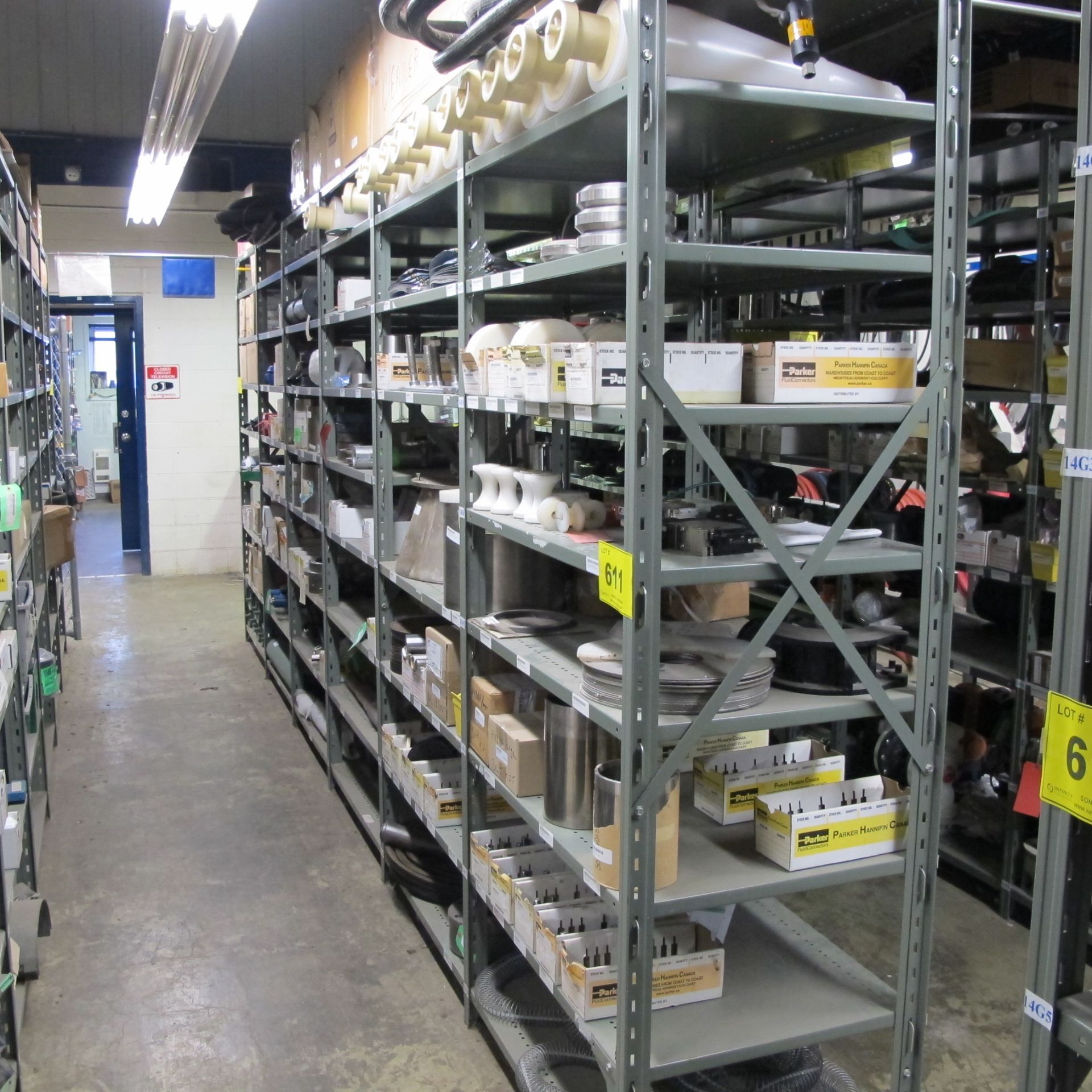 LOT OF (6) SECTIONS OF RACKING UP TO 9-LEVELS INCLUDING CONTENTS ON BOTH SIDES OF RACK, ROLLS,