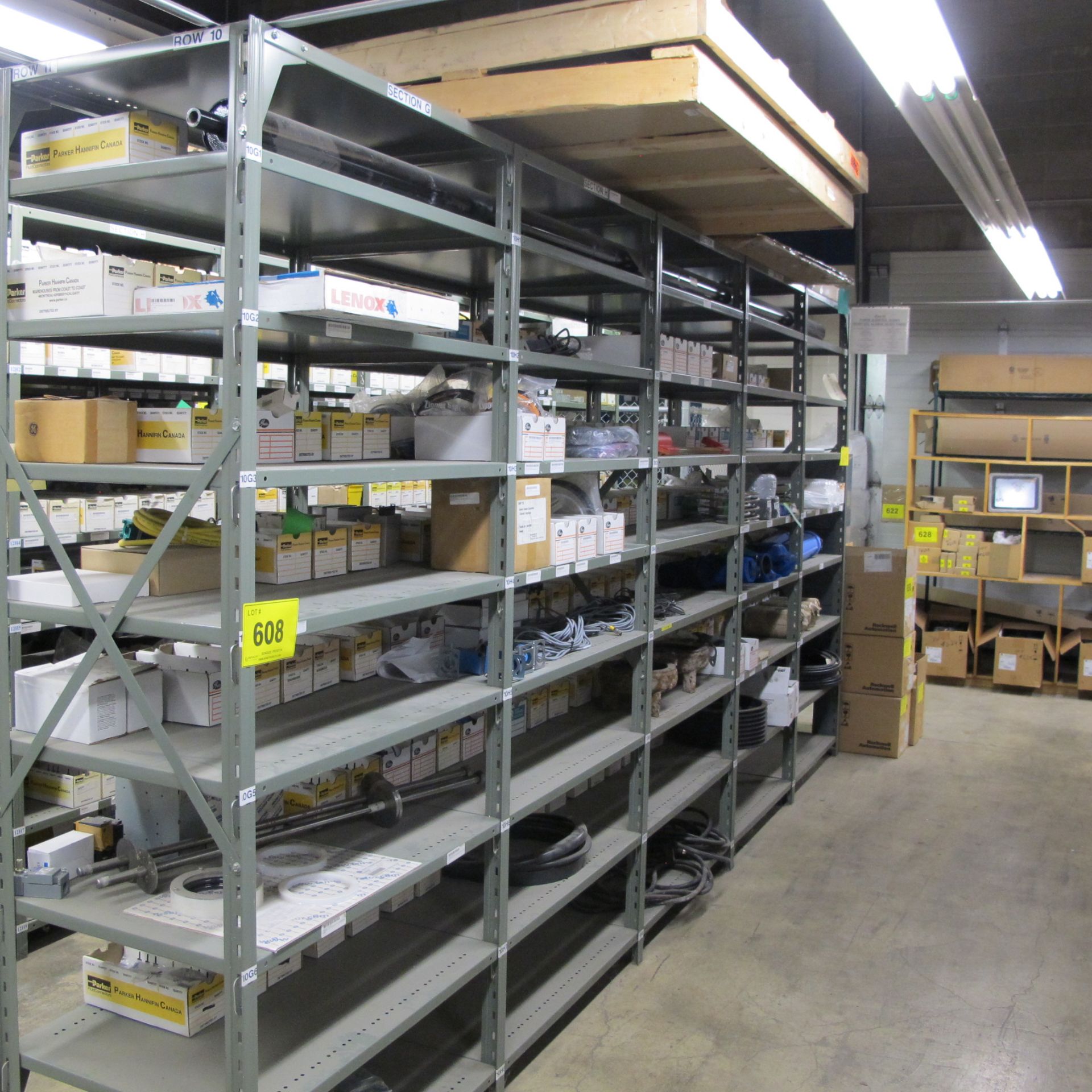 LOT OF (5) SECTIONS OF RACKING UP TO 9-LEVELS INCLUDING CONTENTS ON BOTH SIDES OF RACK, WIRING,