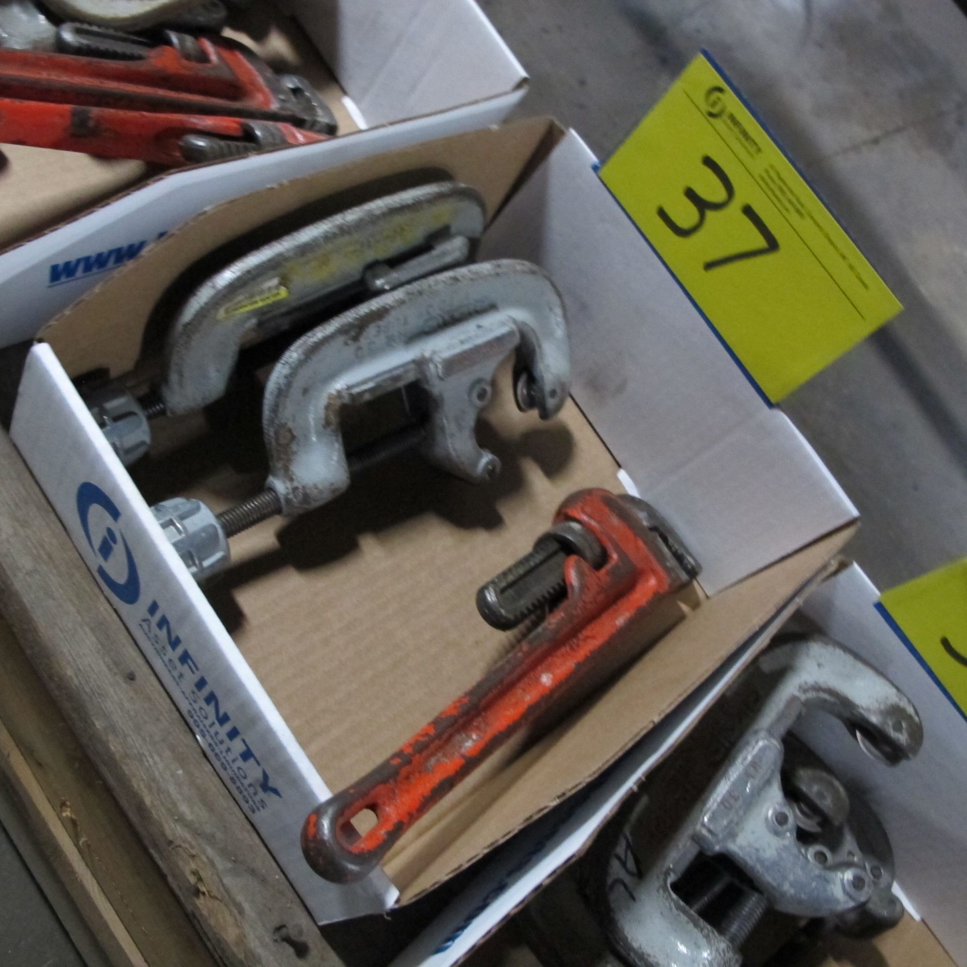 LOT OF (1) BOX W/ (2) RIDGID PIPE CUTTERS 1-3", (1) RIDGID PIPE WRENCH 14"