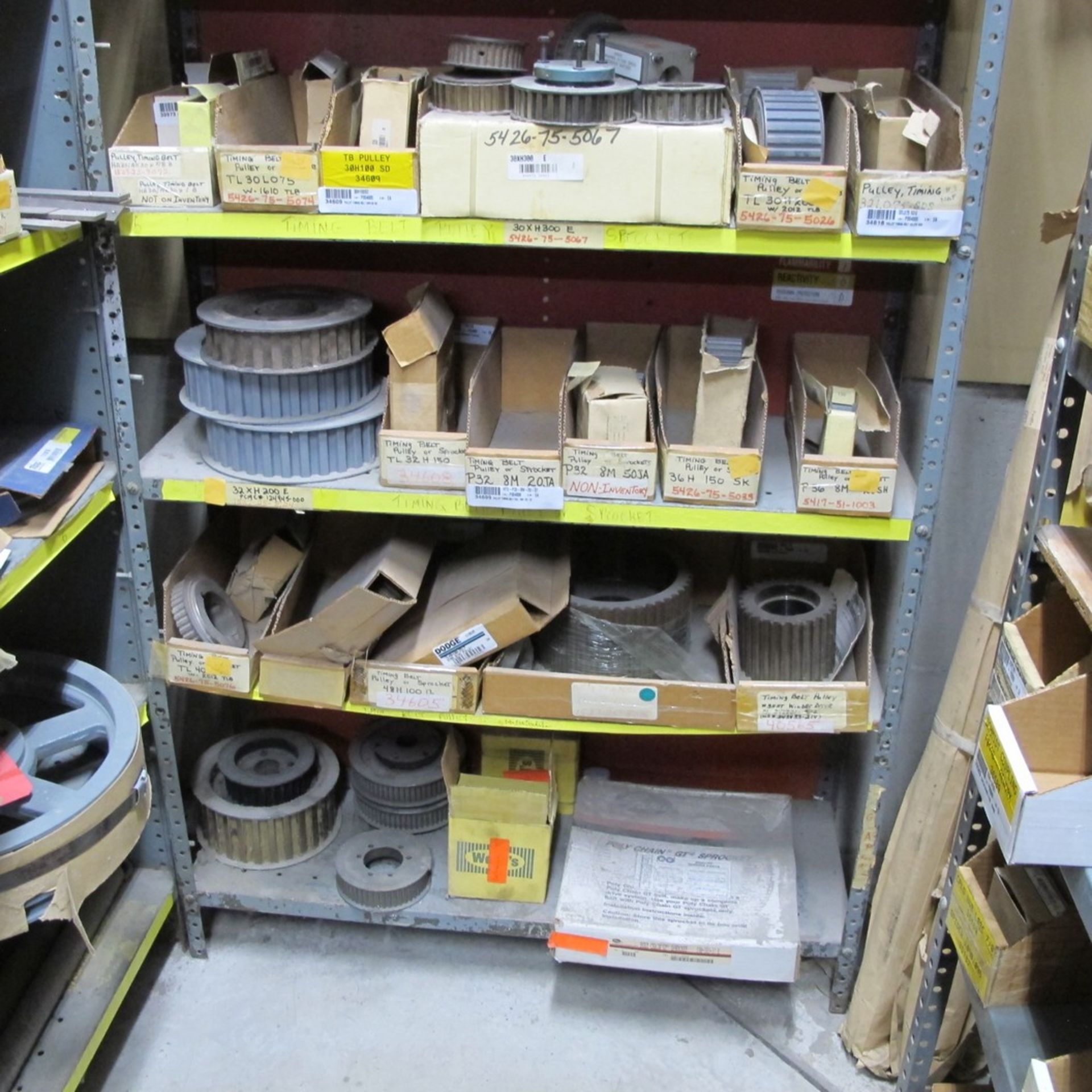 LOT OF ASST. PULLIES, TIMING BELTS, PRINTER PARTS, CLEANER, WRAPPER PARTS W/ (4) SECTIONS OF RACKING - Image 12 of 12