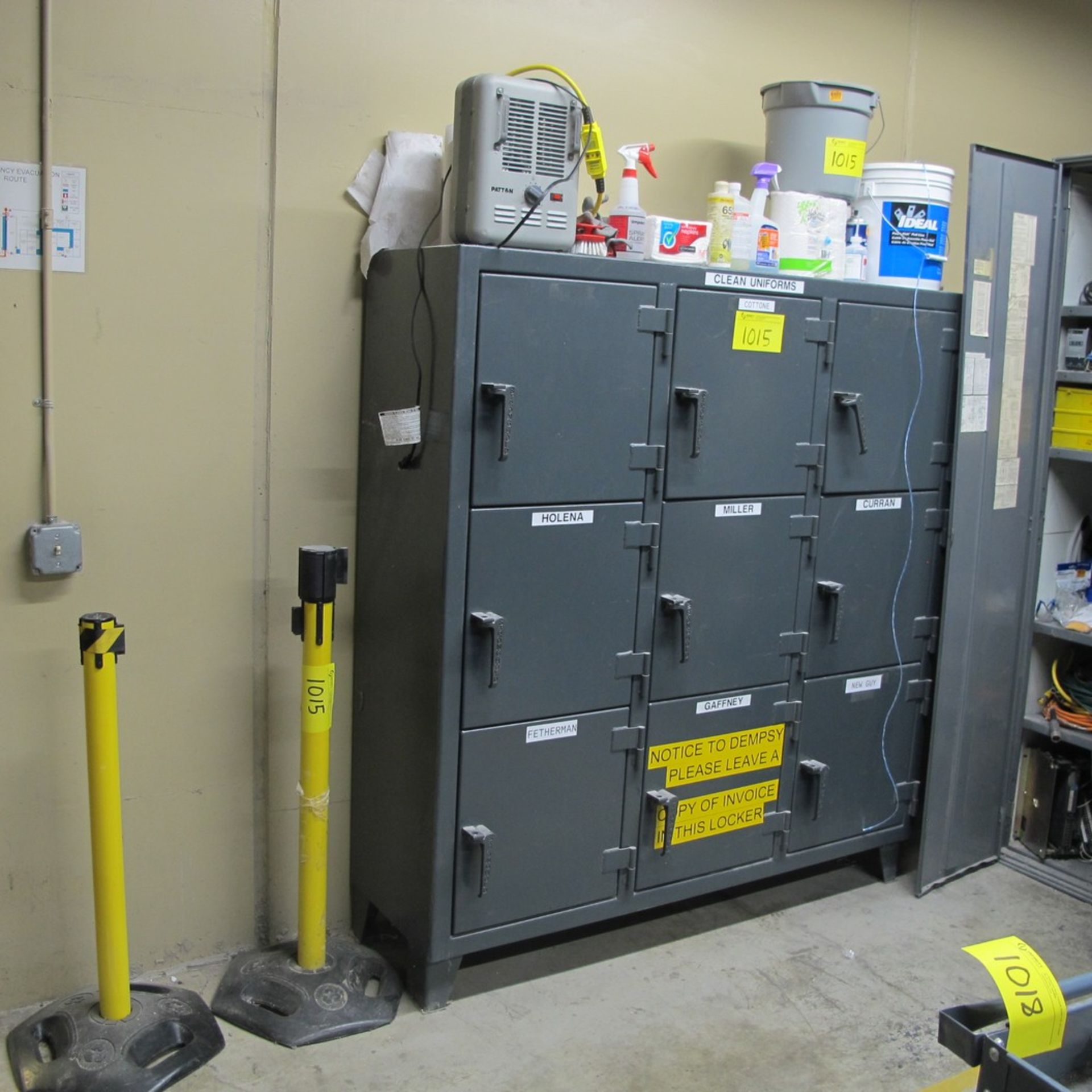 METAL CABINET W/ (9) DOORS AND CONTENTS ABOVE W/ EXTENDABLE SAFETY FENCE (NORTH ELECTRICAL ROOM)