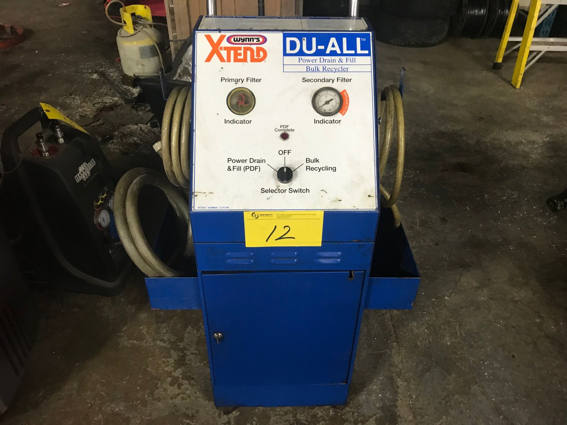 WYNN'S X-TEND DU-ALL POWER DRAIN X FILL BULK RECYCLER, PATENT NUMBER 5,318,700