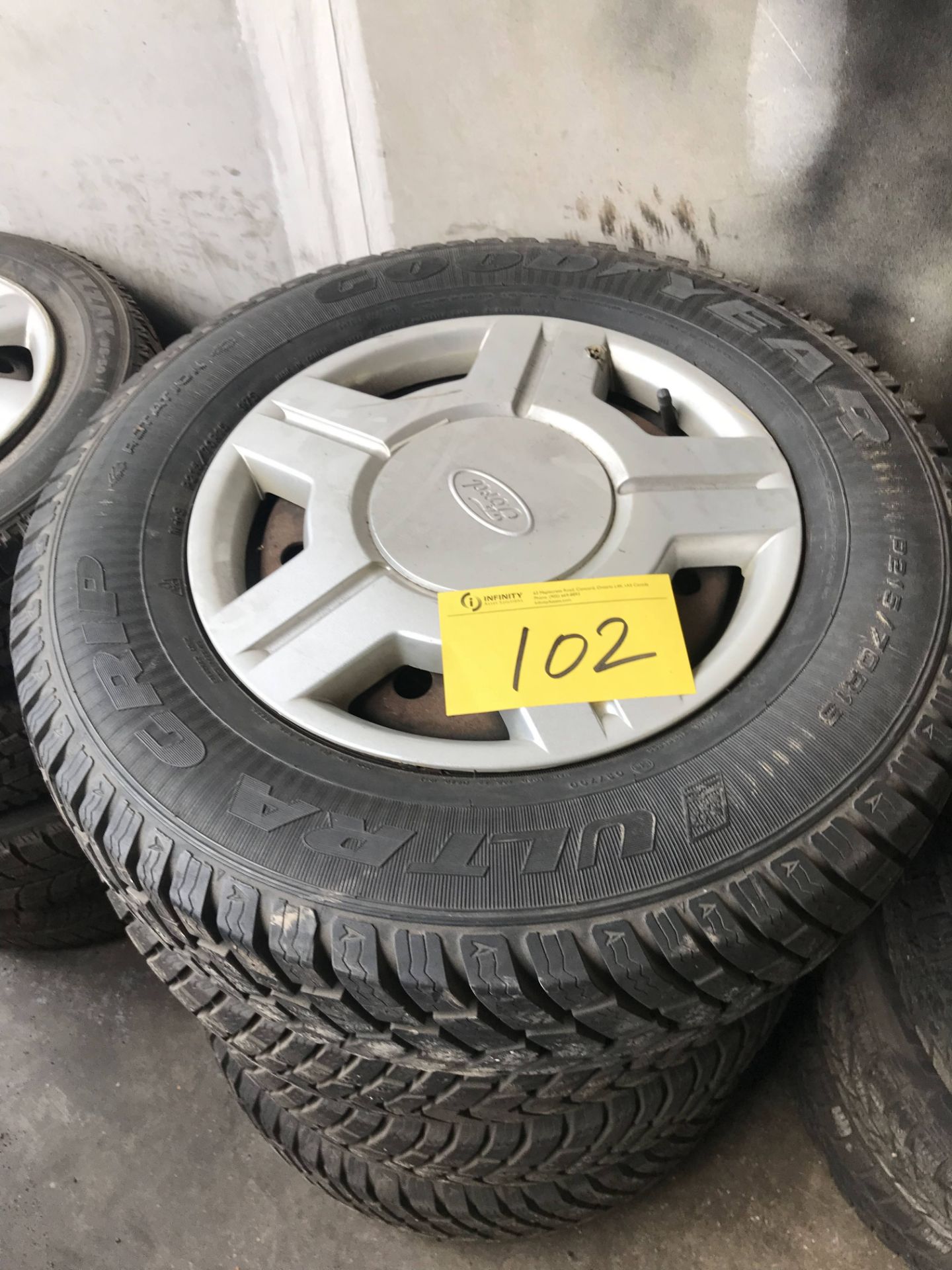 LOT (4) GOODYEAR ULTRA GRIP TIRES, P215/70R15 WINTER