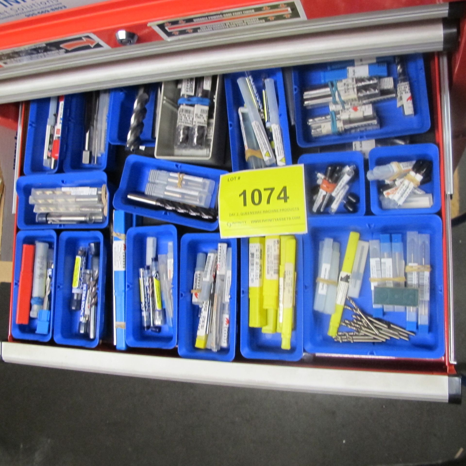 CONTENTS OF 1-DRAWER OF TOOL CART INCLUDING TAPS, END MILLS, DRILL BITS W/ BLUE BINS